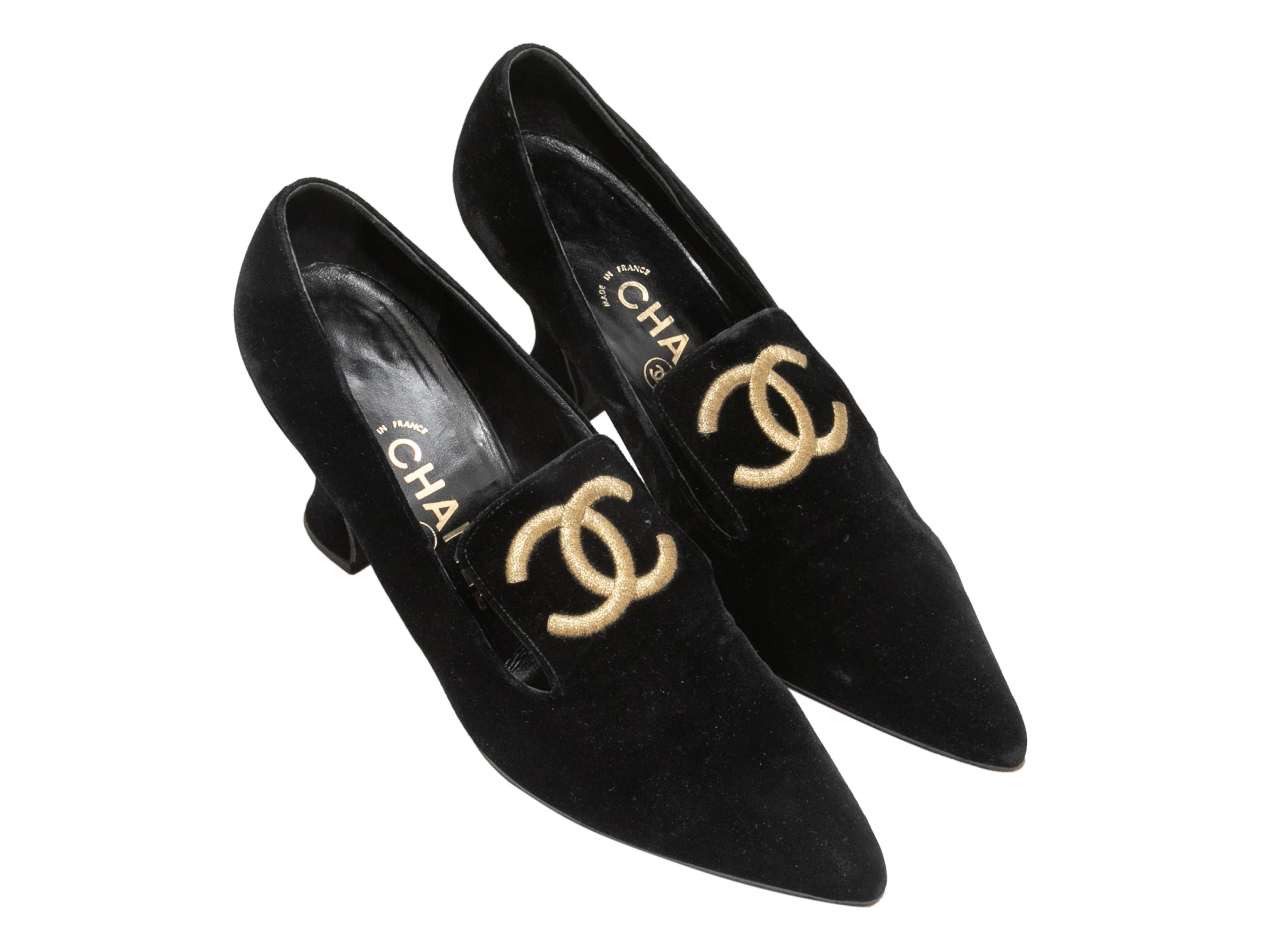 Vintage black velvet pointed-toe pumps by Chanel. Embroidered gold CC logos at tops. Kitten heels. 3