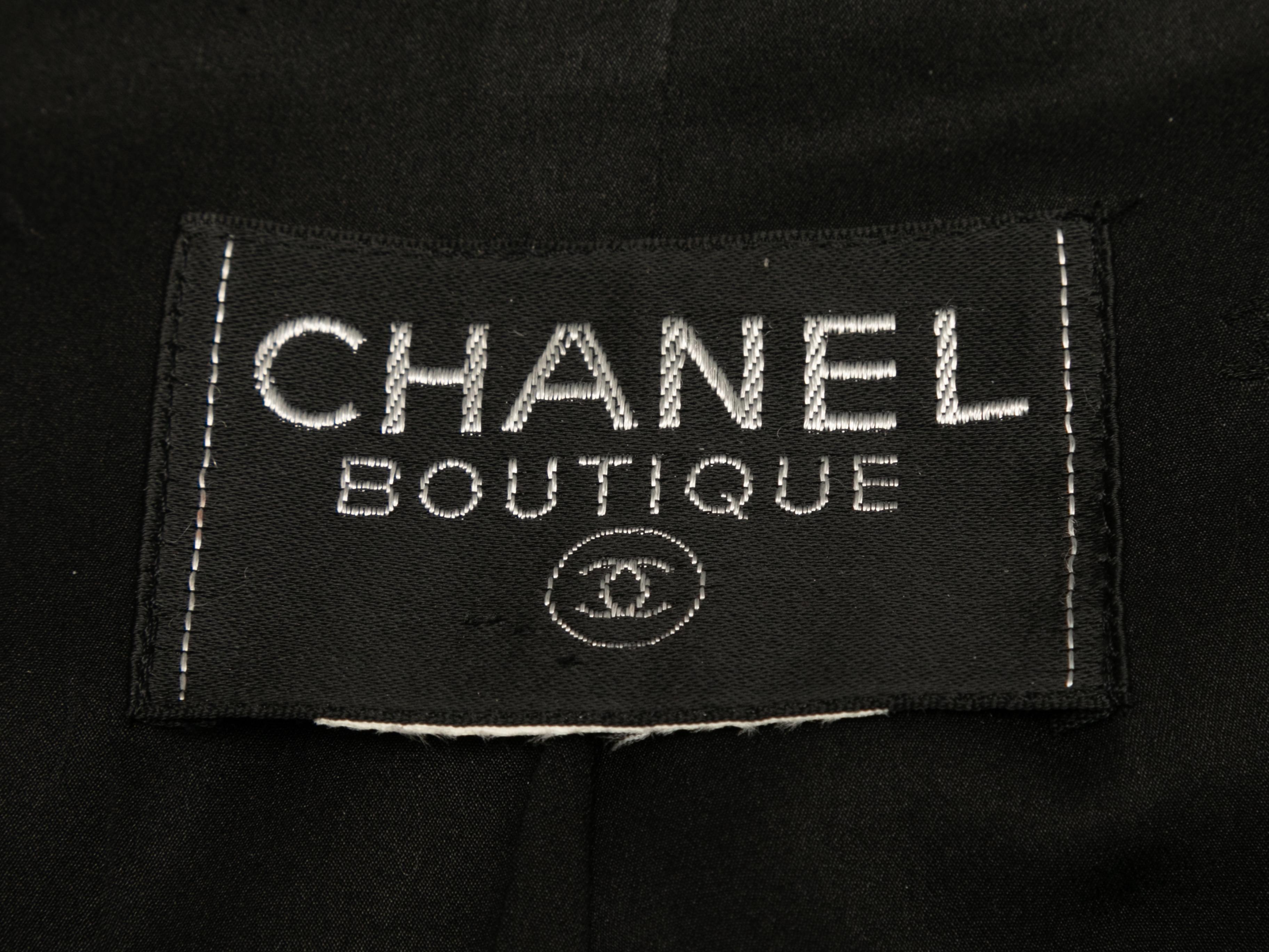 Vintage black blazer by Chanel. Notched lapel. Single CC front button closure. 38