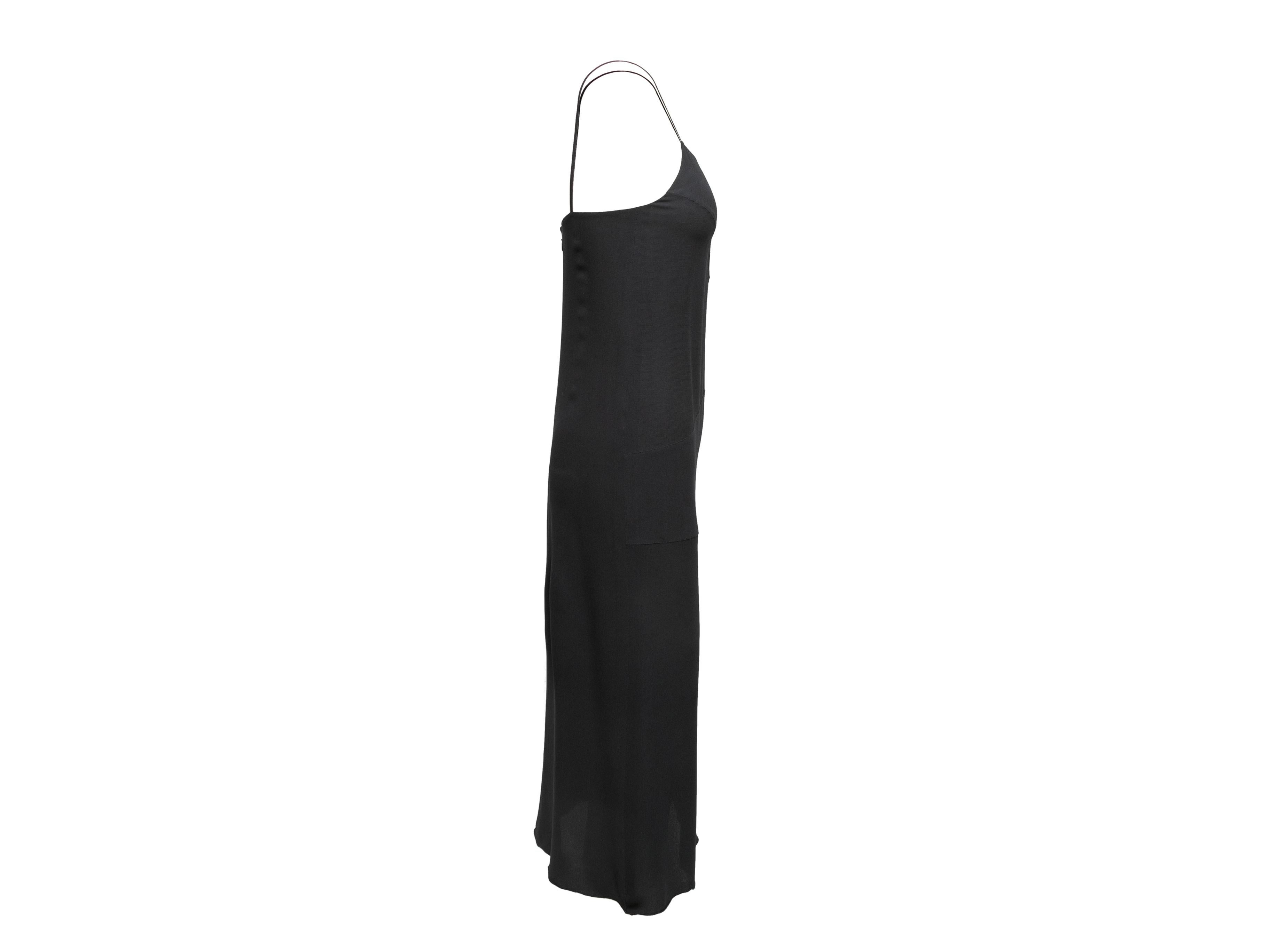 Vintage black silk sleeveless maxi dress by Chanel Boutique. From the Fall 1997 Collection. Scoop neckline. Narrow straps. Zip closure at center back. Designer size 38. 30