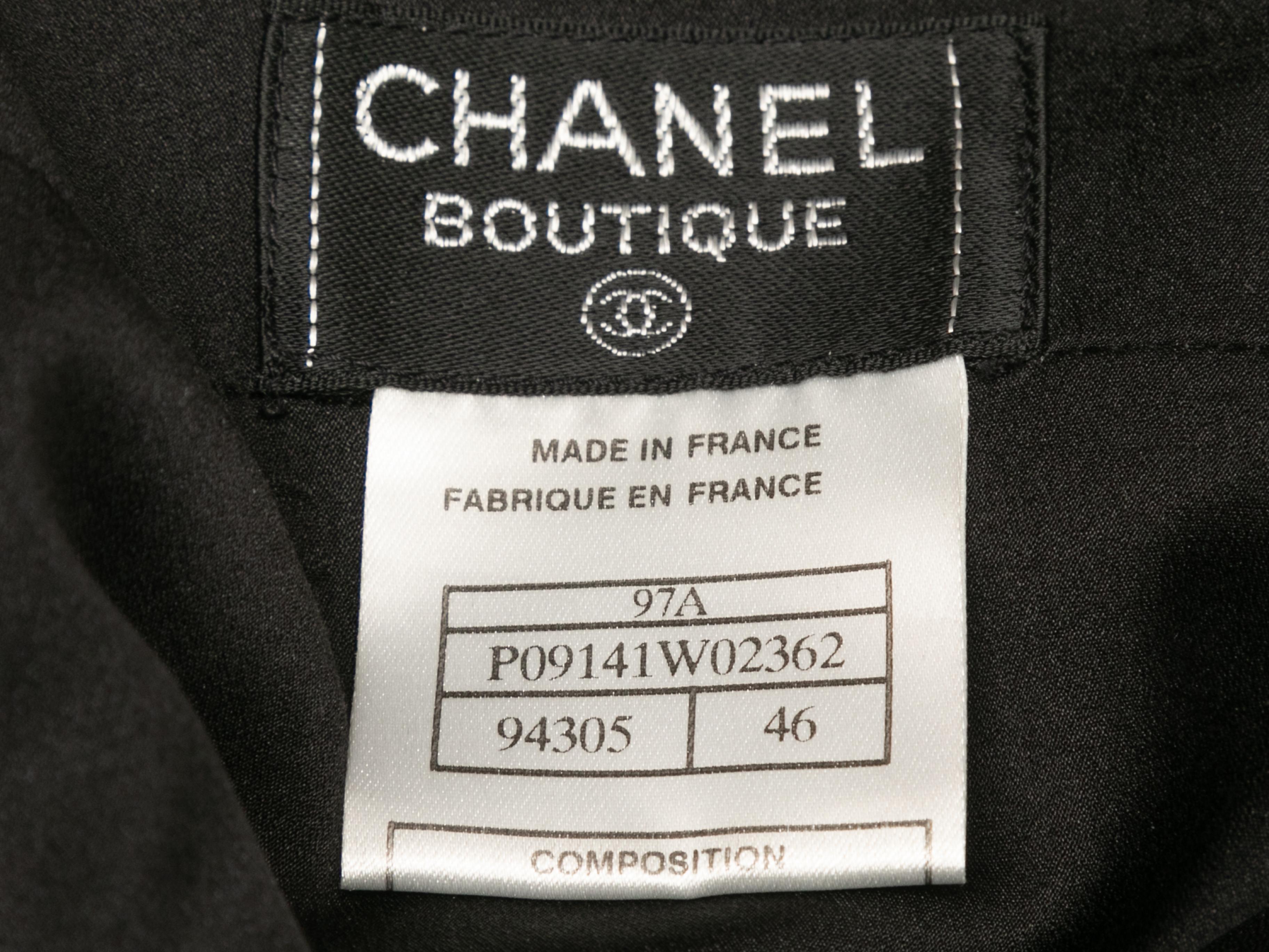 Vintage black wool pencil skirt by Chanel Boutique. From the Fall/Winter 1997. Zip closure at back. 30
