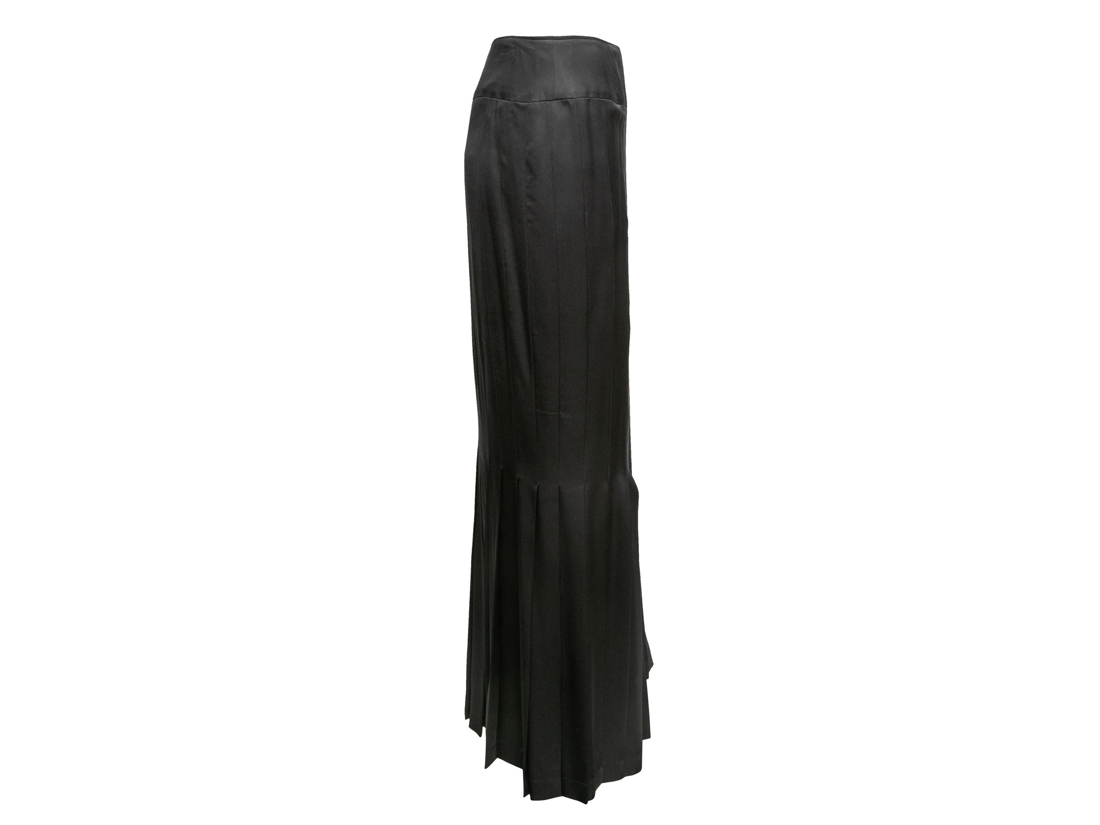 Vintage black pleated silk maxi skirt by Chanel. From the Cruise 2005 Collection. Zip closure at back. 37