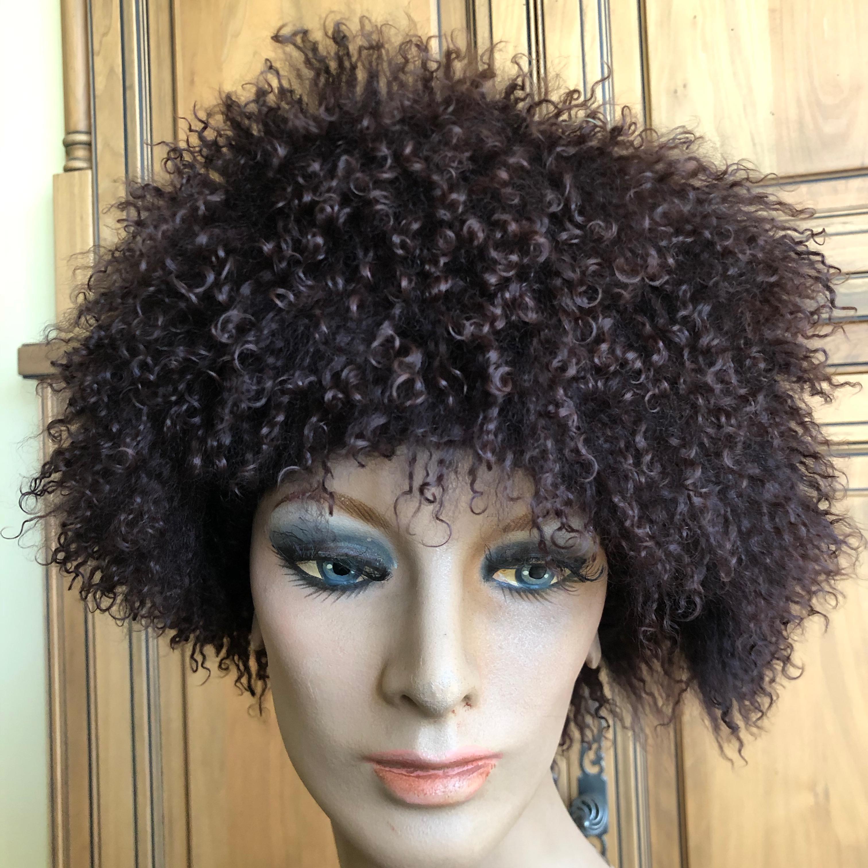 Vintage Black Curly Lamb Beret Hat from Neiman Marcus, by Karl Donahue
Size 57 or 58
In excellent condition