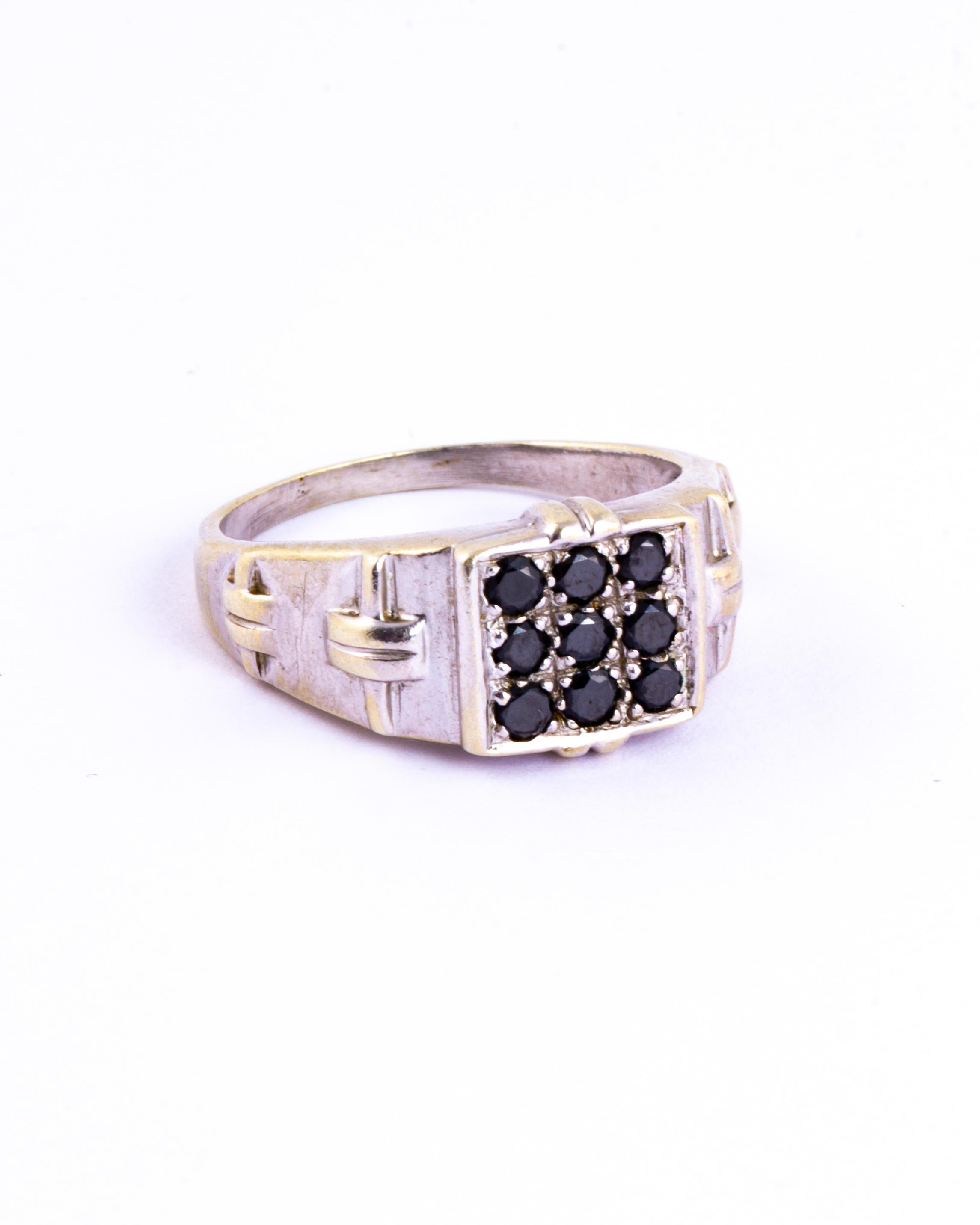 This signet ring is modelled in 9ct white gold which is perfectly complimented with black diamonds. The total carat weight is approximately 90pts. Made in Birmingham, England. 

Ring Size: Y 1/2 or 12 1/4
Face Dimensions: 11x11.5mm

Weight: 8.7g