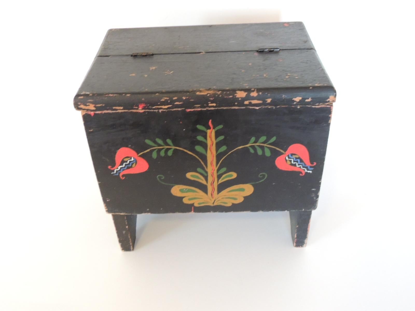 Vintage black Folk Art style shoe shine box/kit.
Primitive floral design in shades of red, green, gold, blue, white and black.
Stylized tree of life painted on all four sides.
Size: 11