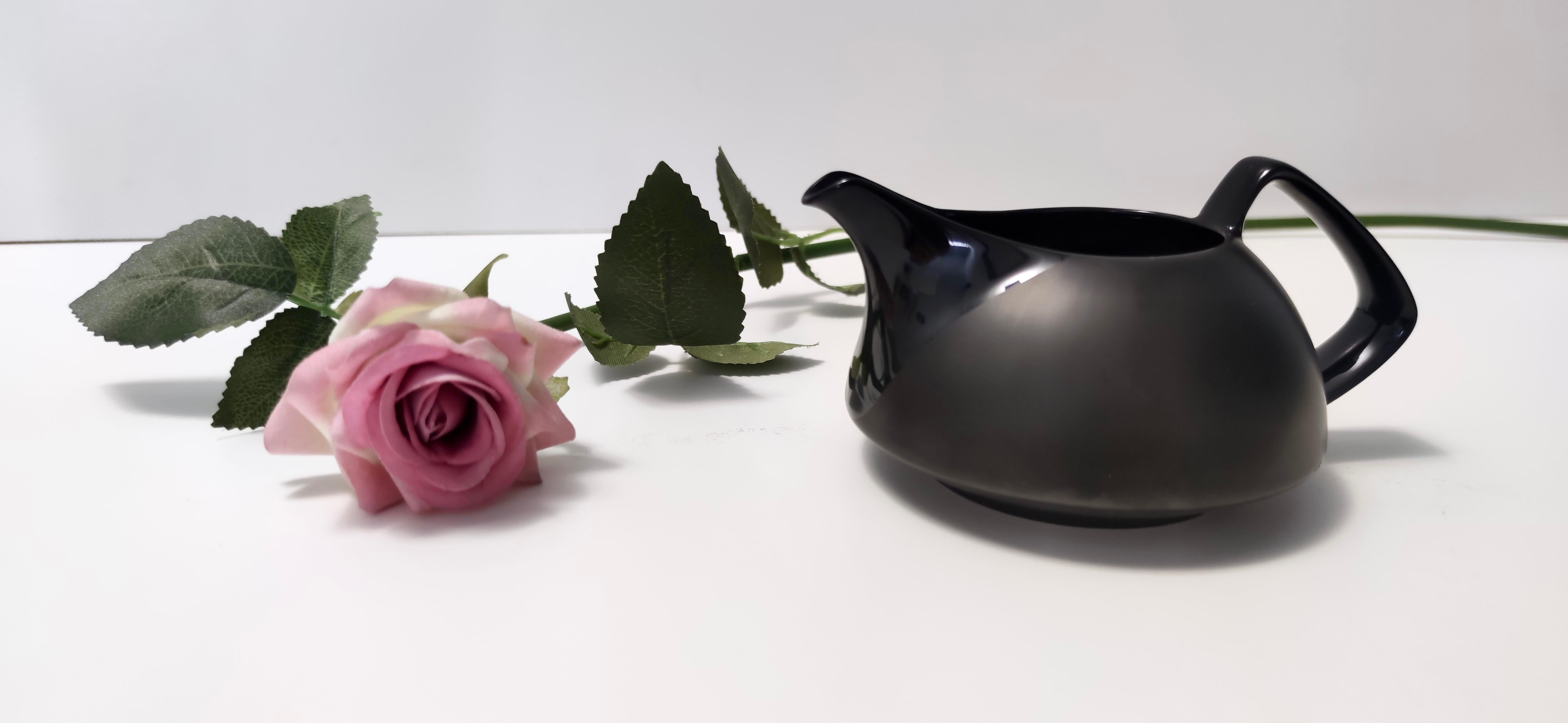 Made in Germany in 1969 by Walter Gropius for Rosenthal Studio Line. 
It is made in black porcelain with both a matte and glazed finish.
This milk jug is a vintage piece, therefore it might show slight traces of use but it can be considered as in