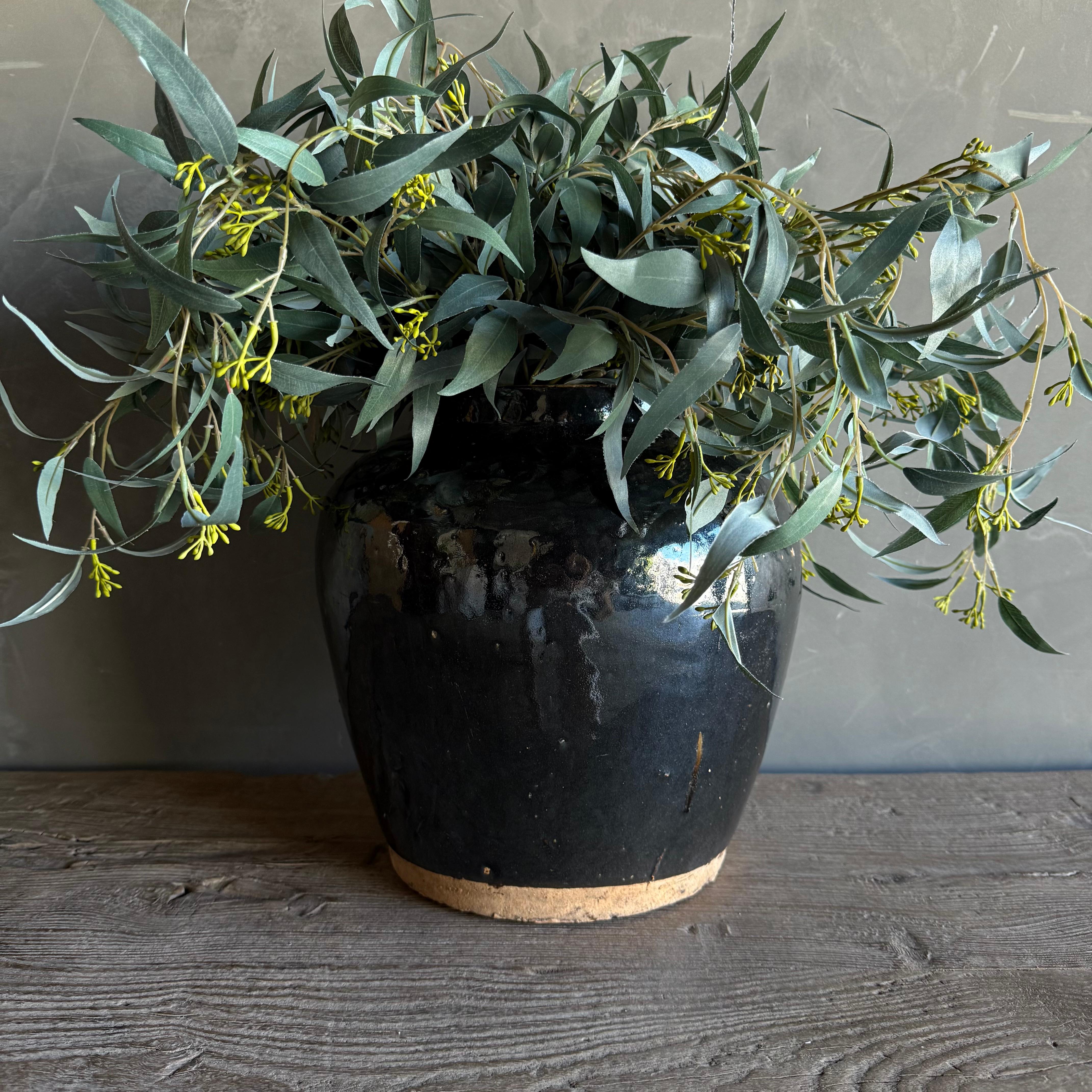 Small black glazed pottery, wabi sabi style with perfect imperfections.
Overall Size: 11