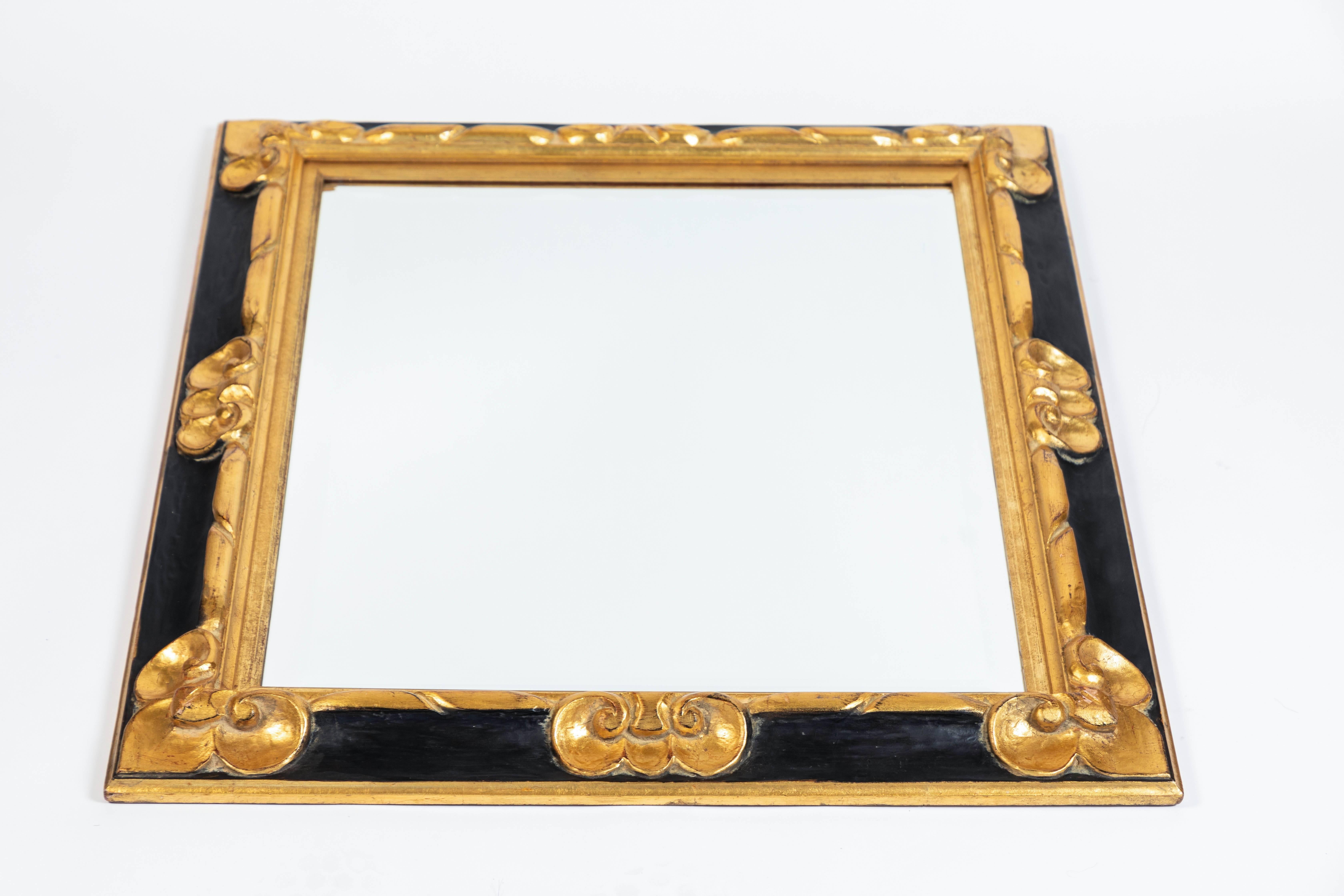 Vintage black & gold finished wood frame with new bevelled mirror.
