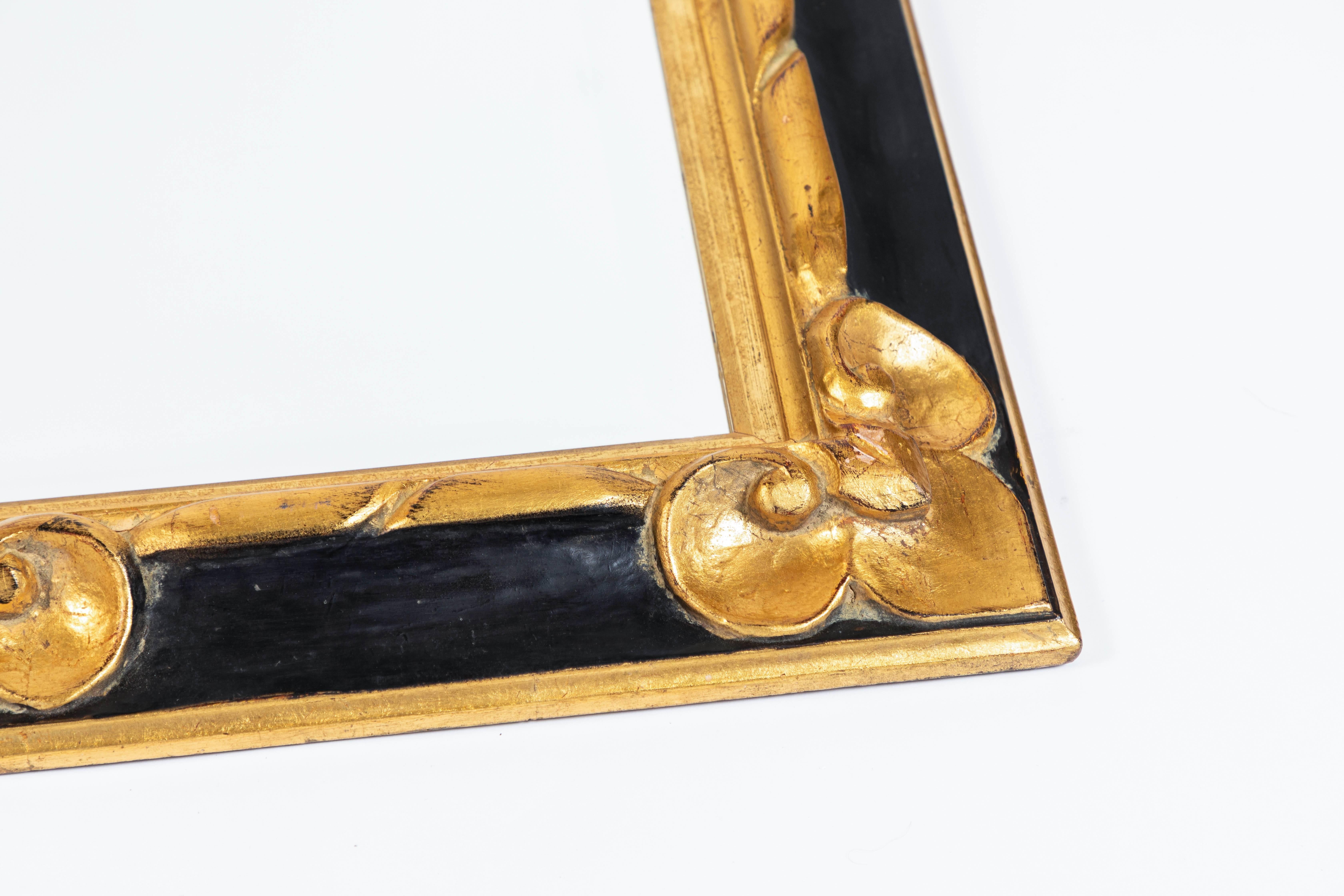 black and gold antique mirror