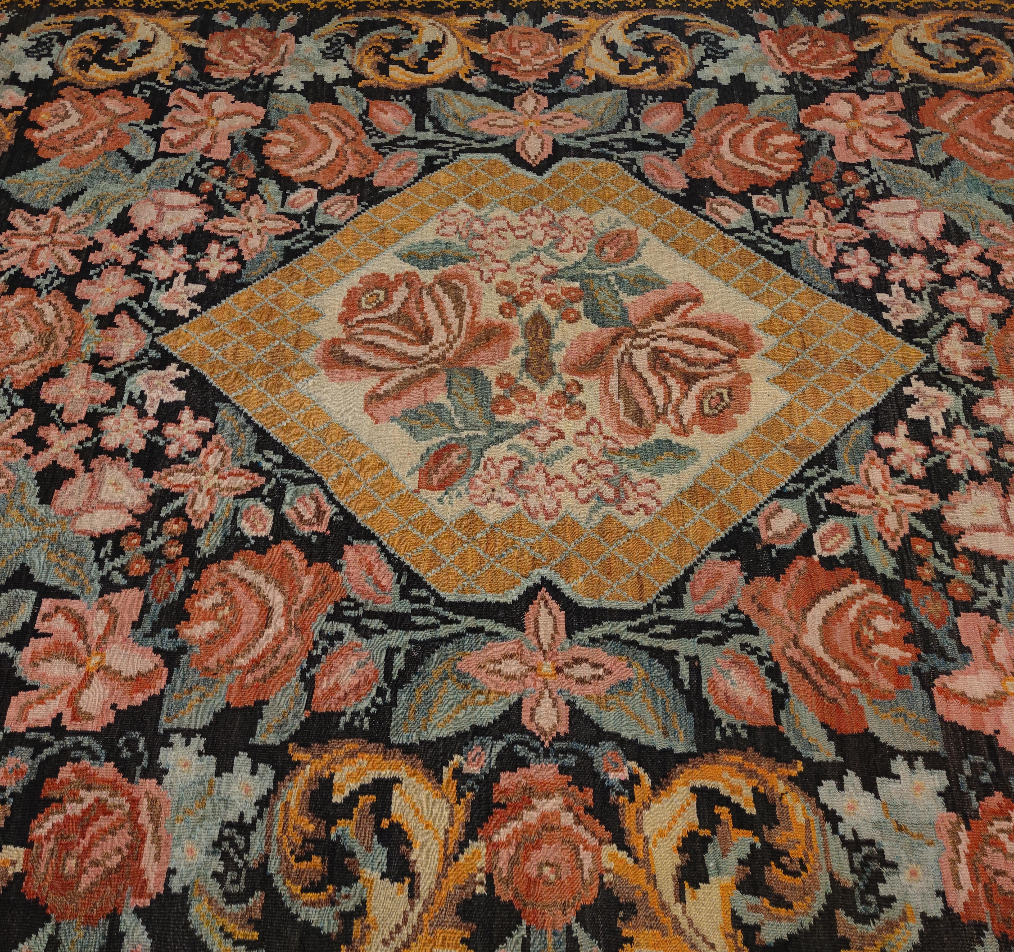 Ukrainian Vintage Black Ground Bessarabian Kilim with Botanical Pattern For Sale