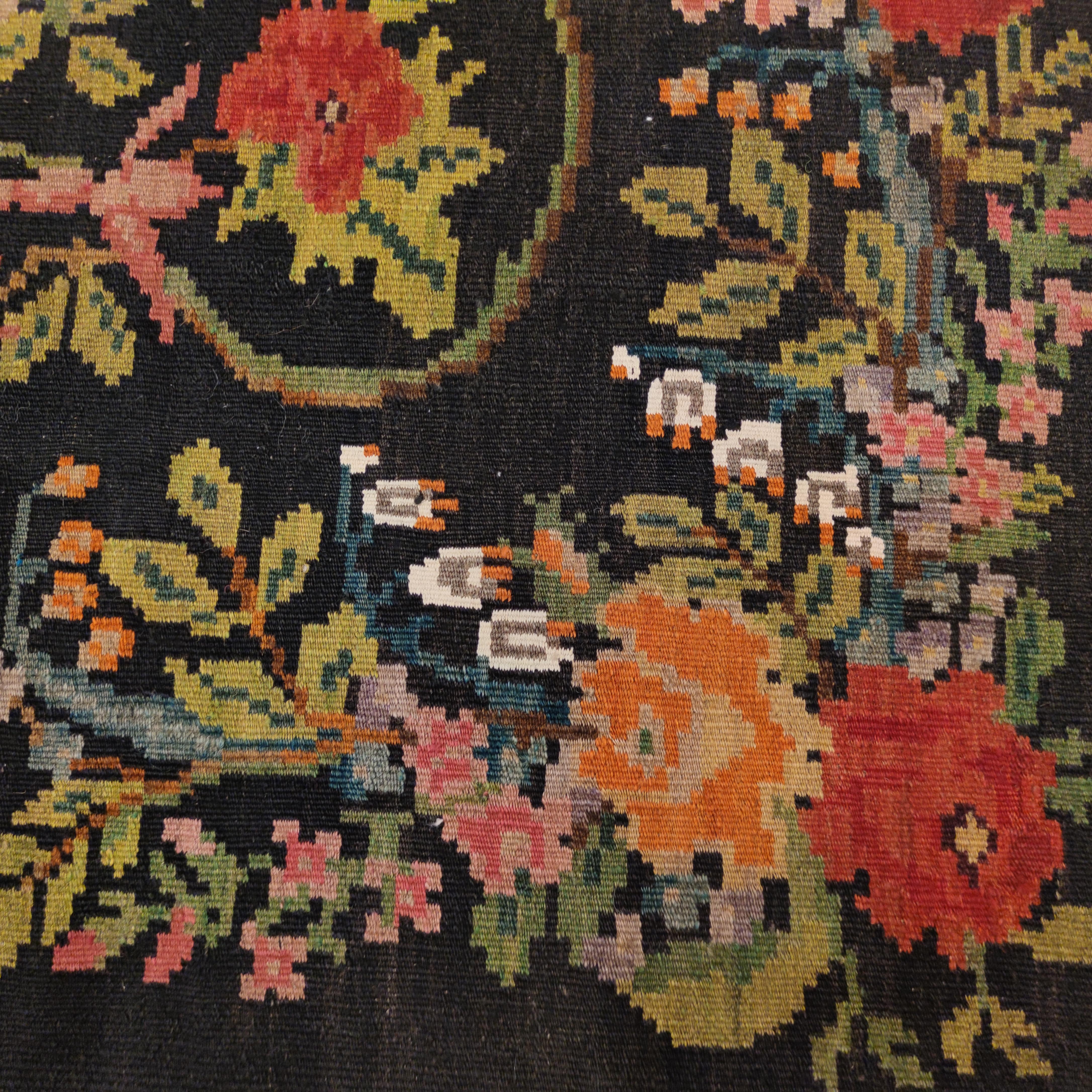 Hand-Woven Vintage Black Ground Bessarabian Kilim with Botanical Pattern For Sale