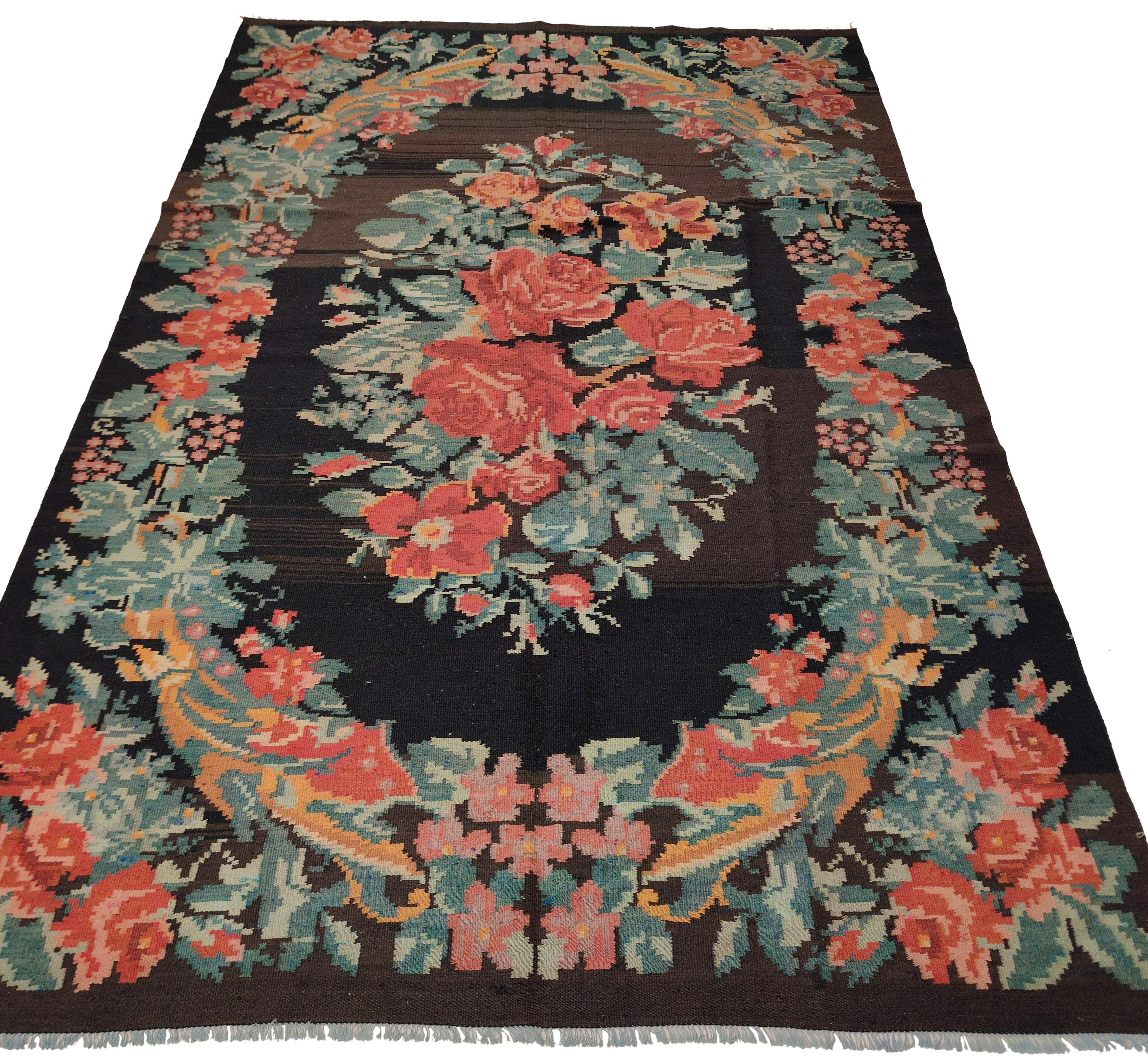 Hand-Woven Vintage Black Ground Bessarabian Kilim with Botanical Pattern For Sale
