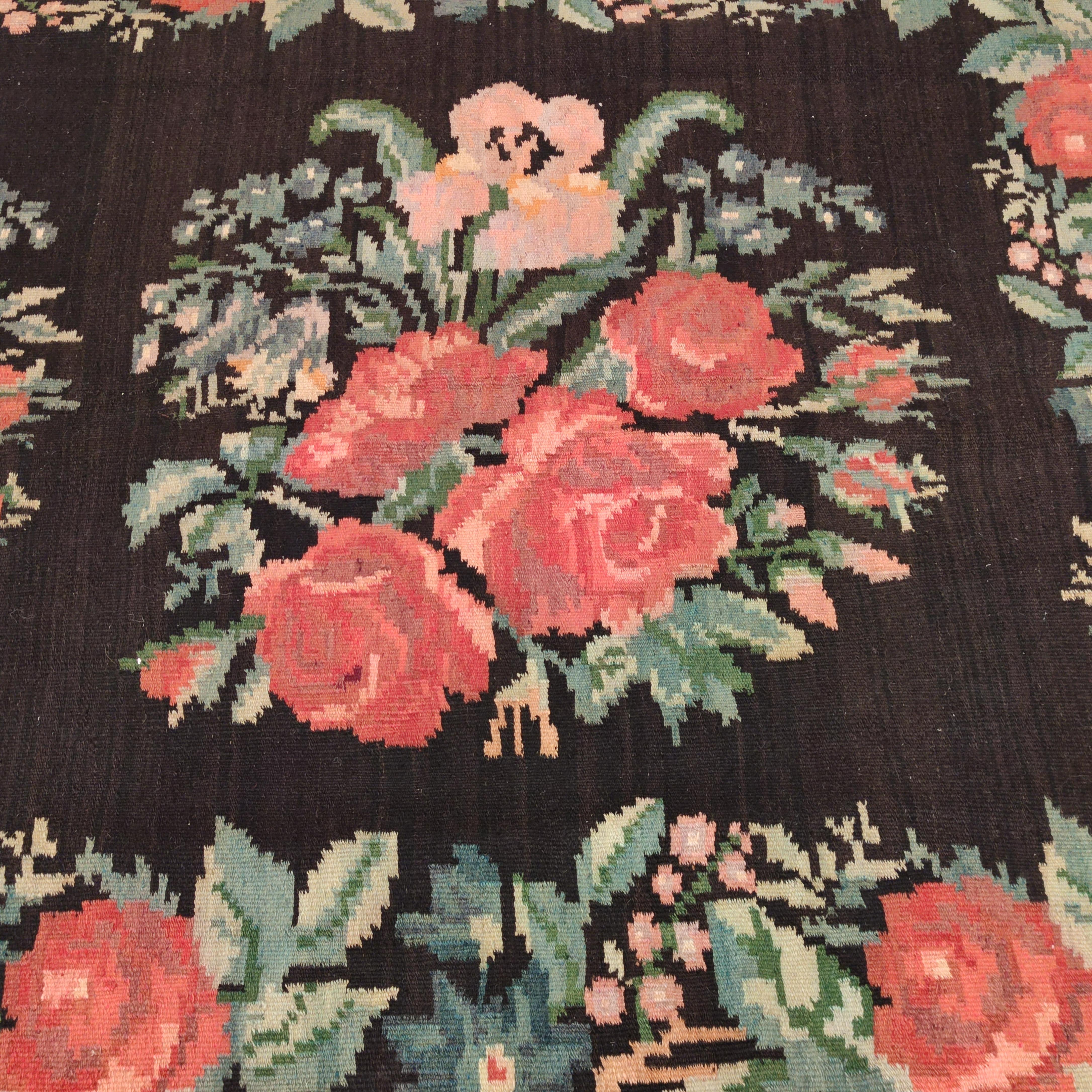 Hand-Woven Vintage Black Ground Bessarabian Kilim with Botanical Pattern For Sale