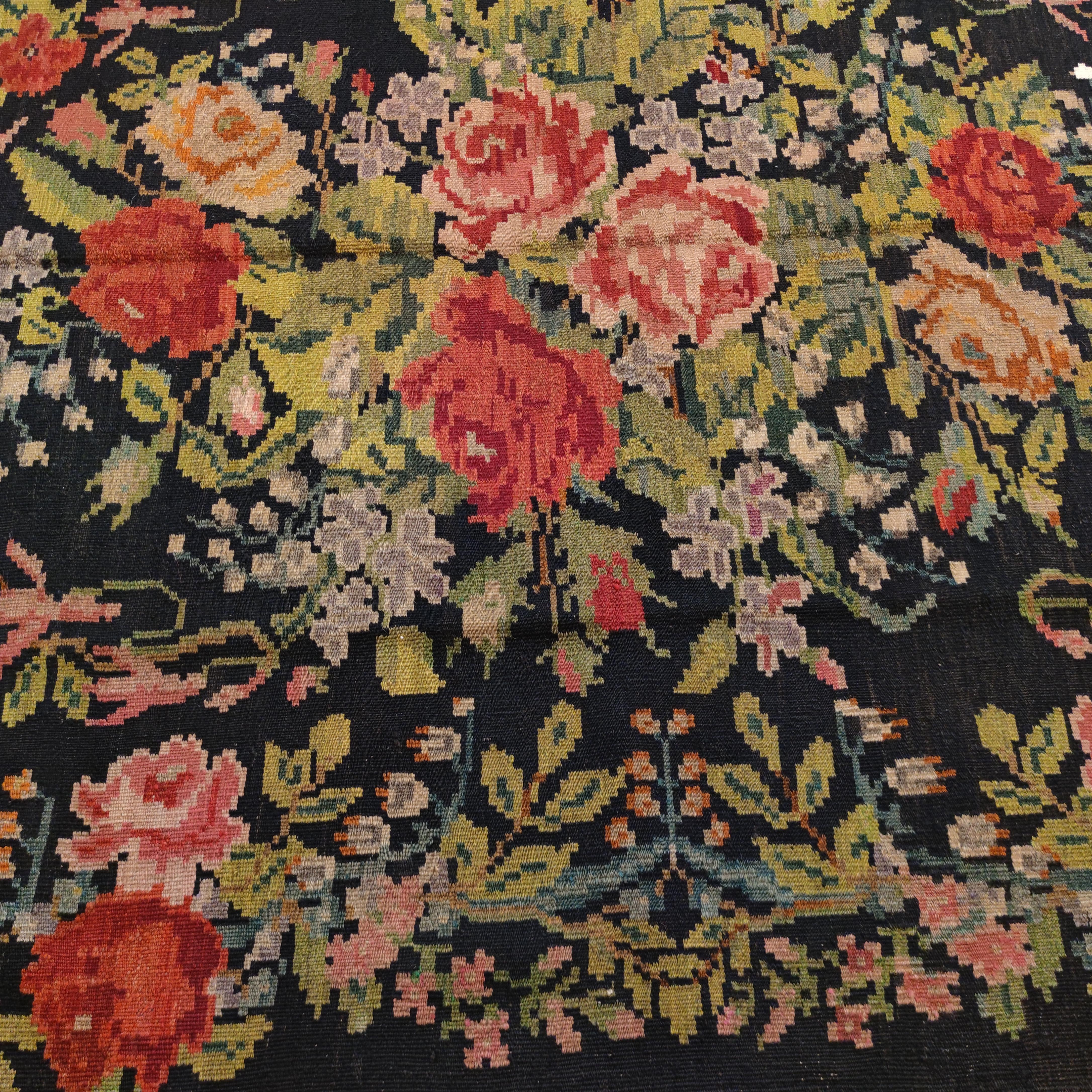 Wool Vintage Black Ground Bessarabian Kilim with Botanical Pattern For Sale