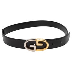 Cintura vintage nera Gucci con fibbia GG a due toni