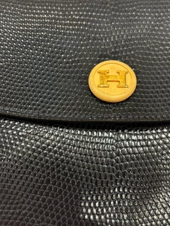 Vintage Hermes Rio Exotic Lizard Clutch noir en très bon état