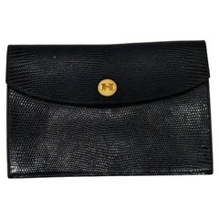Vintage Hermes Rio Exotic Lizard Clutch noir en très bon état