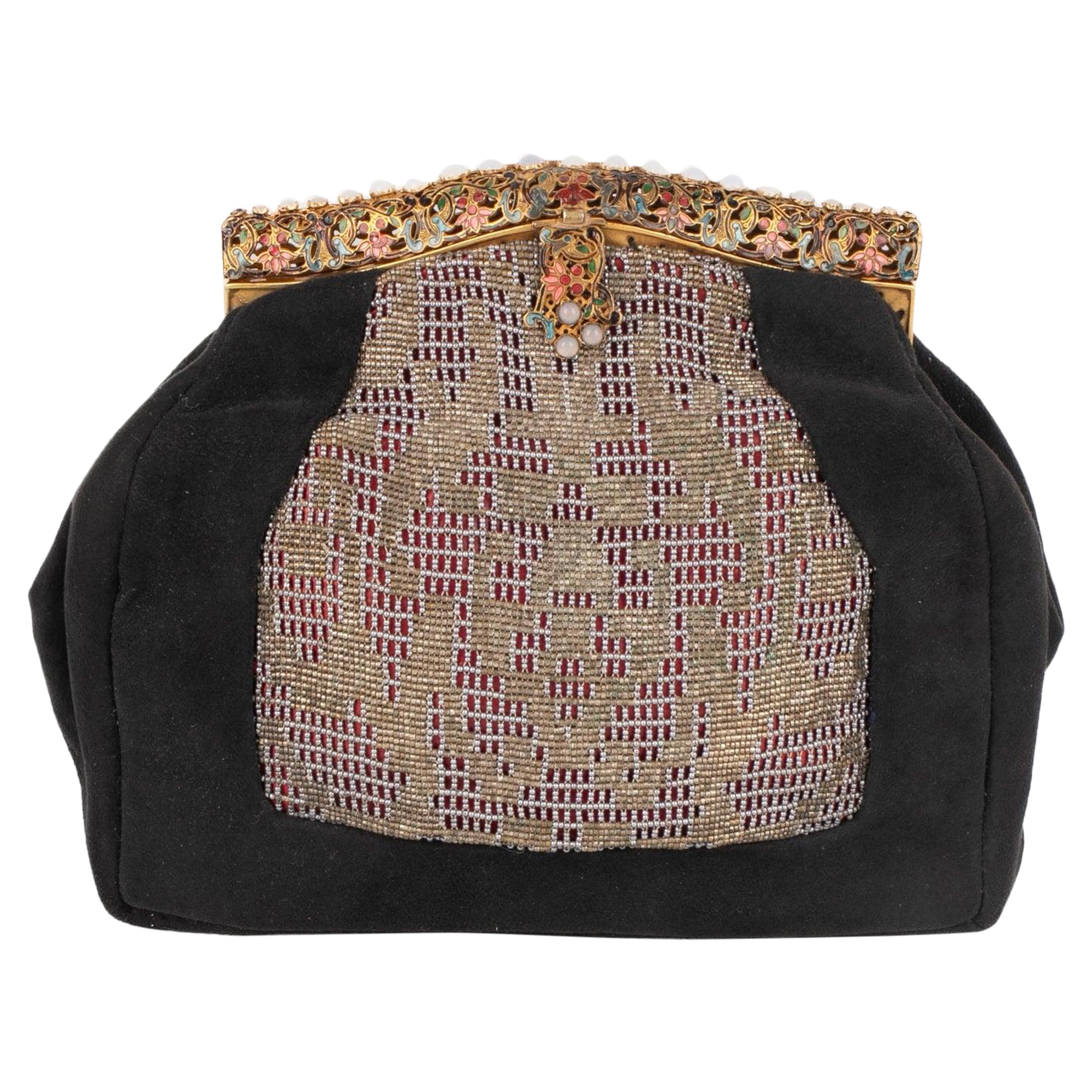 Bolso de mano vintage de piel negra con interior