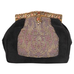 Bolso de mano vintage de piel negra con interior