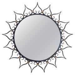 Miroir solaire vintage à cadre en fer forgé noir, Chaty Vallauris Style 1950s