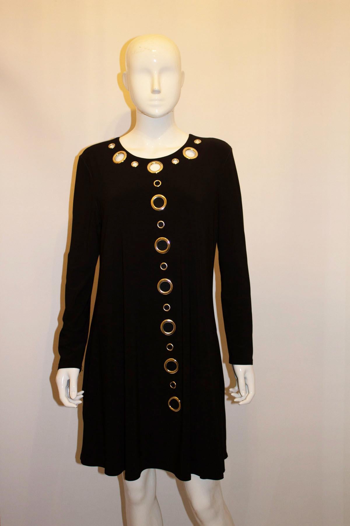 Vintage Black Jersey Dress with Decorative Holes In Good Condition For Sale In London, GB