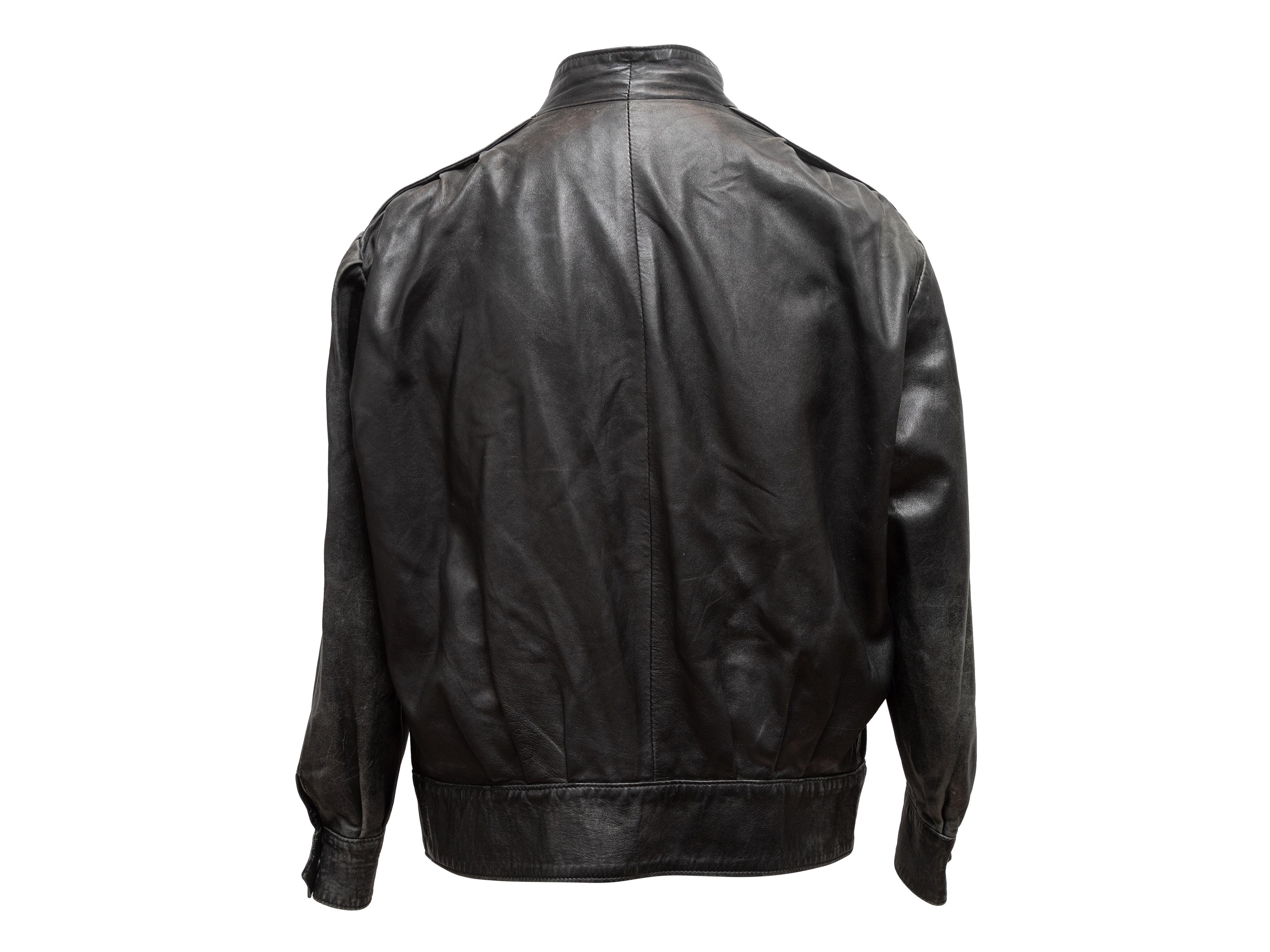 Vintage black leather jacket by Karl Lagerfeld. Circa 1990s. Mandarin collar. Hip pockets. Front closures. 46