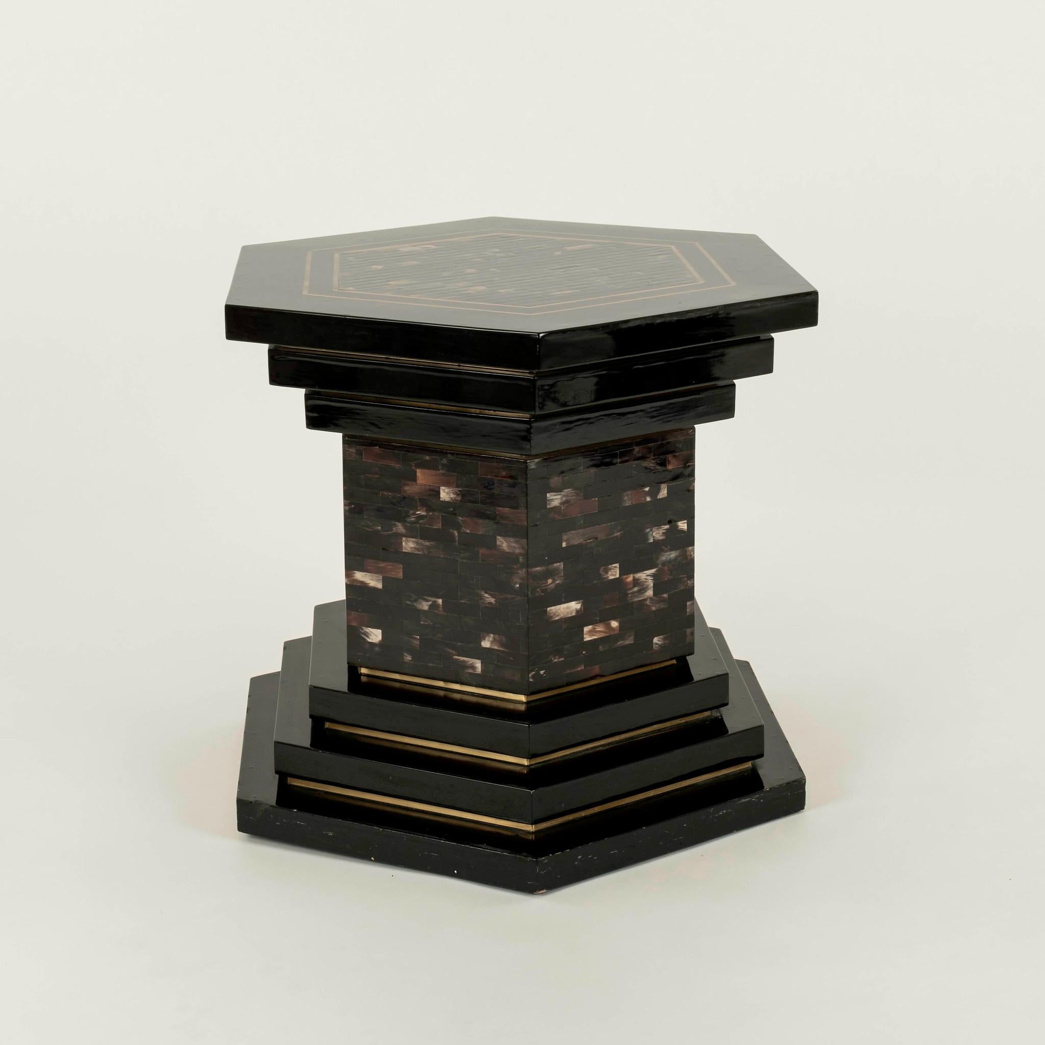 Vintage black lacquered hexagon table (or table base) with horn and brass inlay.
Wonderful as center table by itself or add glass top with multitude of dimensions for dining options.

Dimensions:
Vertex to vertex 36