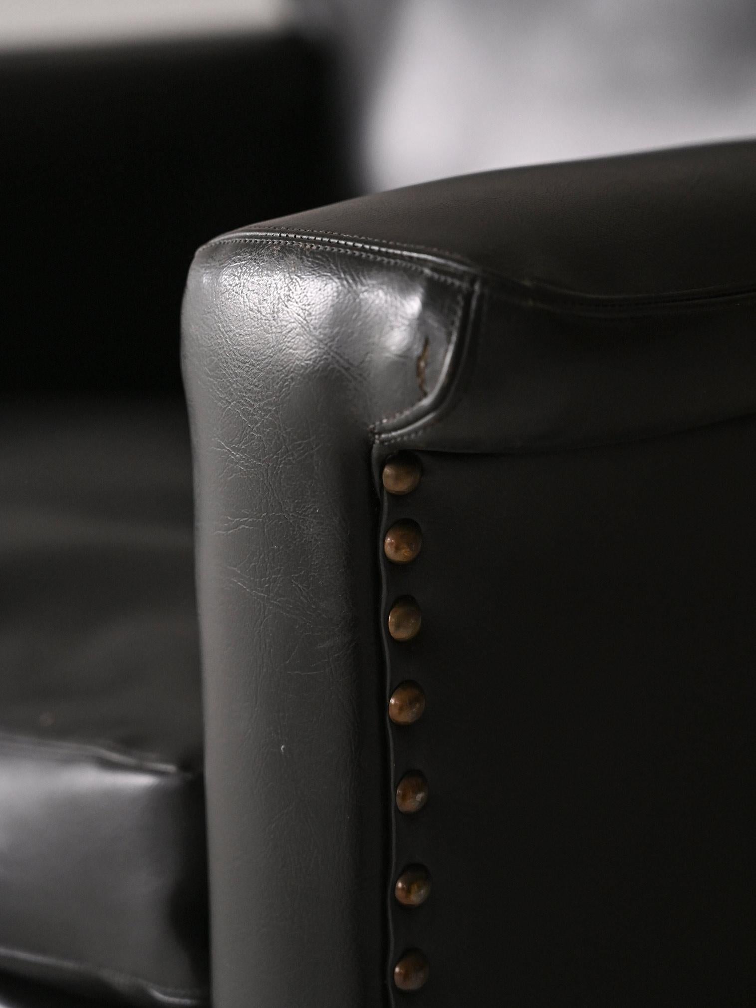 Pelle Poltrona in pelle nera vintage