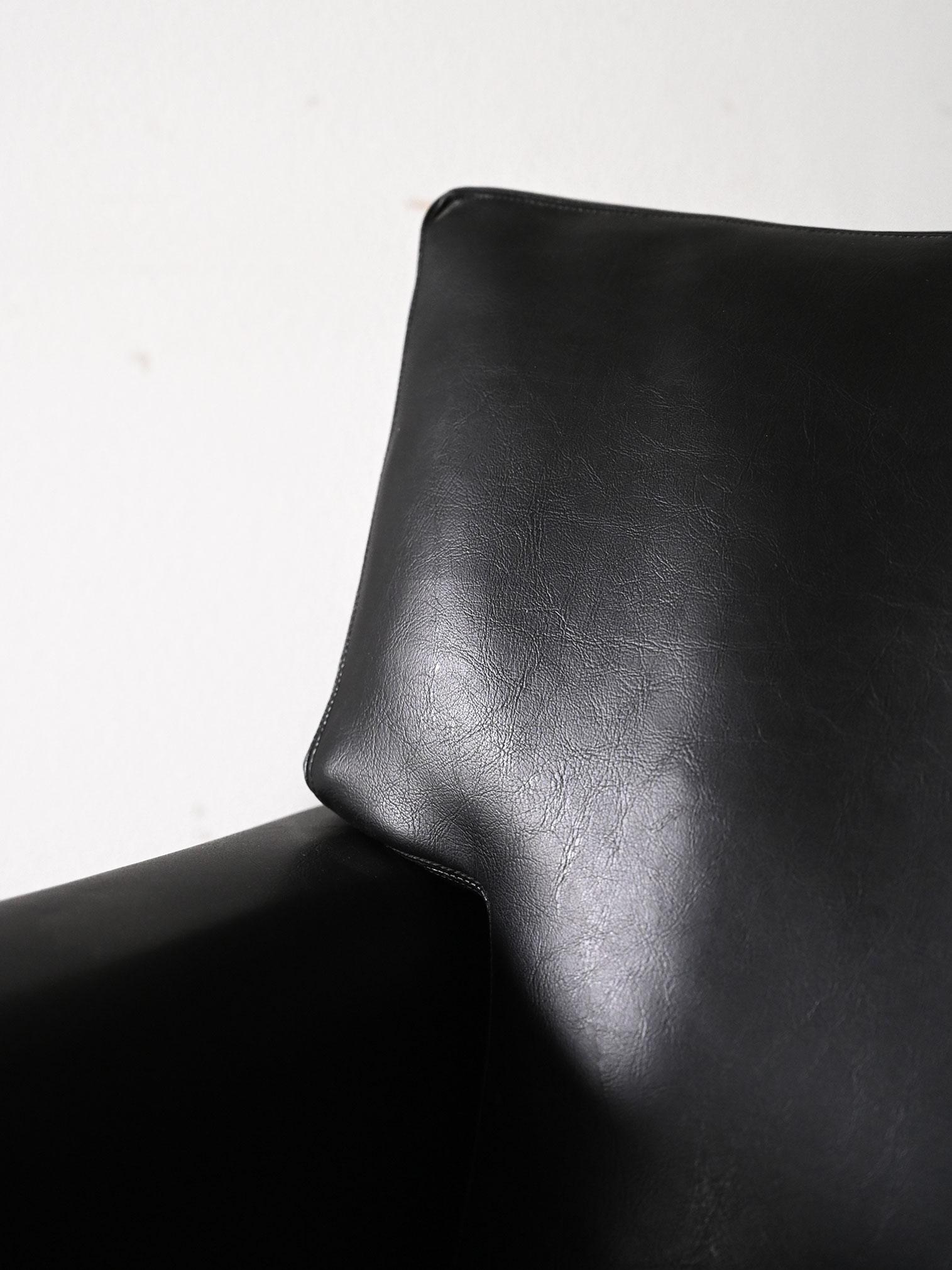 Vintage black leather armchair 1