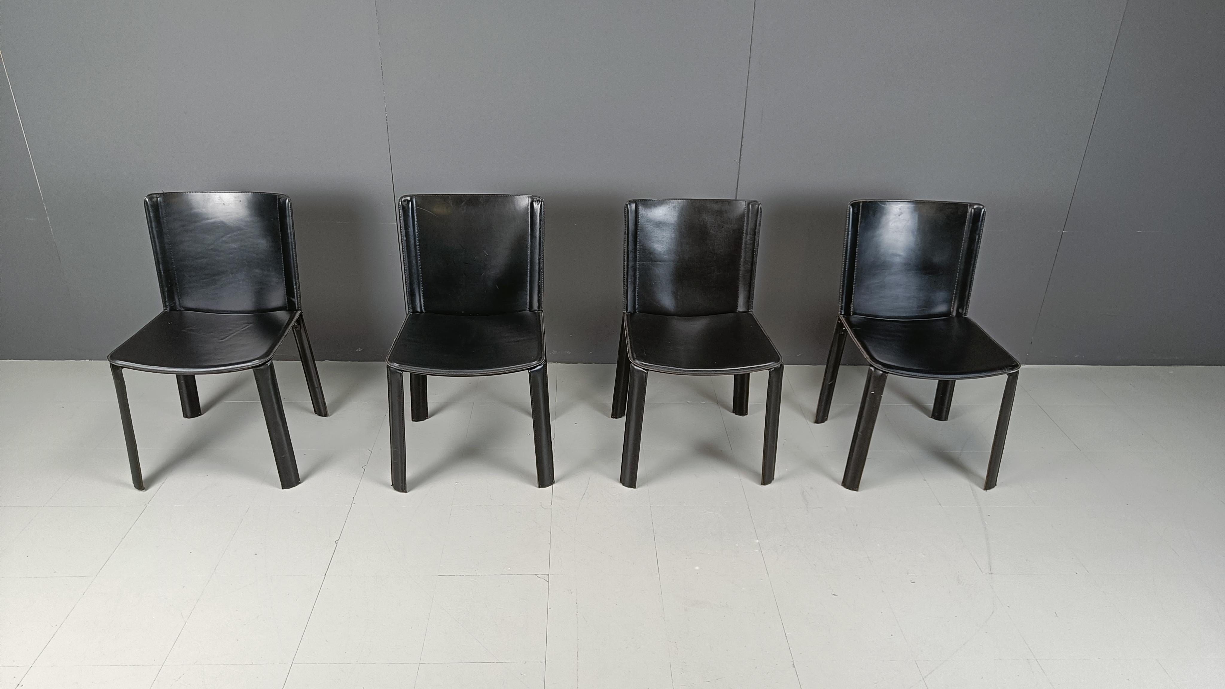 Vintage black leather dining chairs by Cidue, Italy.

These high quality dining chairs have a timeless design and are made of strong leather.

1980s - Italy

Good condition

Dimensions:
Height: 80cm
Width: 47cm
Depth: 45cm
Sea height: 45cm

Price is