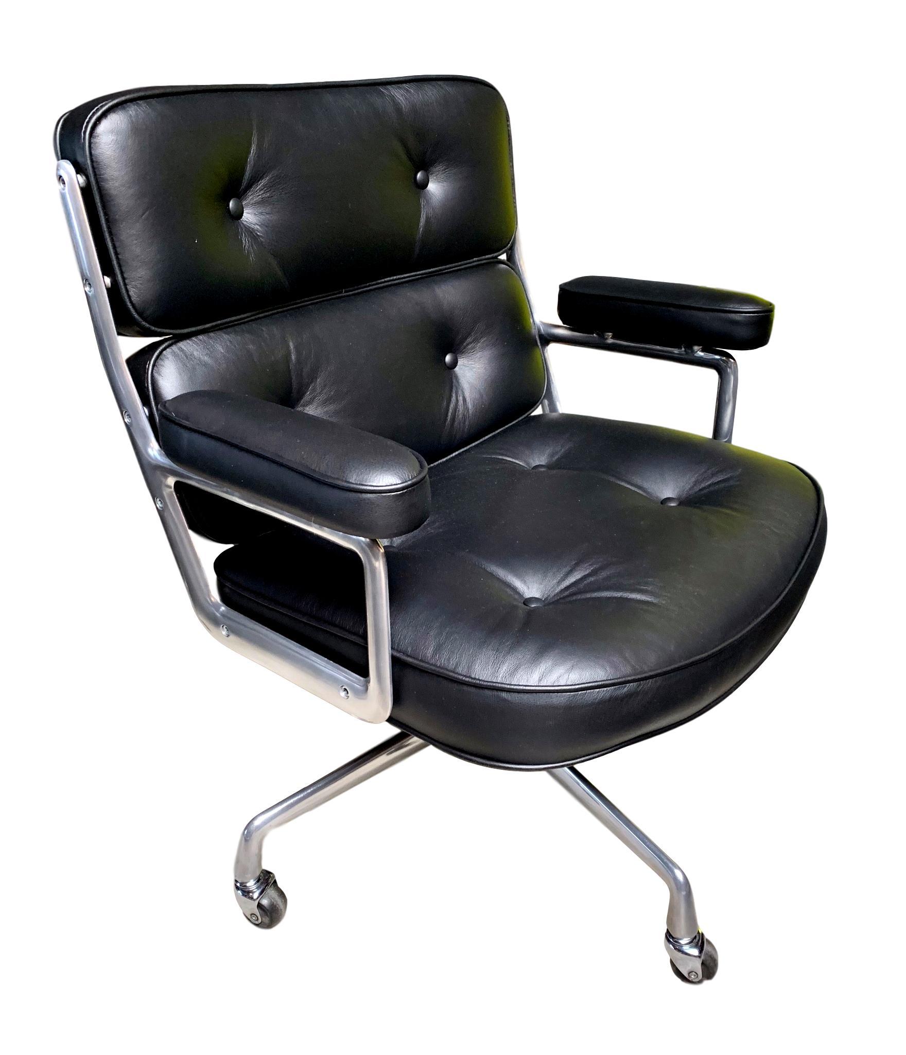 Beautiful vintage Eames Time Life swivel chairs. Black leather and nickel frame. Excellent condition. Leather is pristine. Frame is near flawless. Height adjustable with tilt back mechanism. Offered with original casters. The perfect vintage office