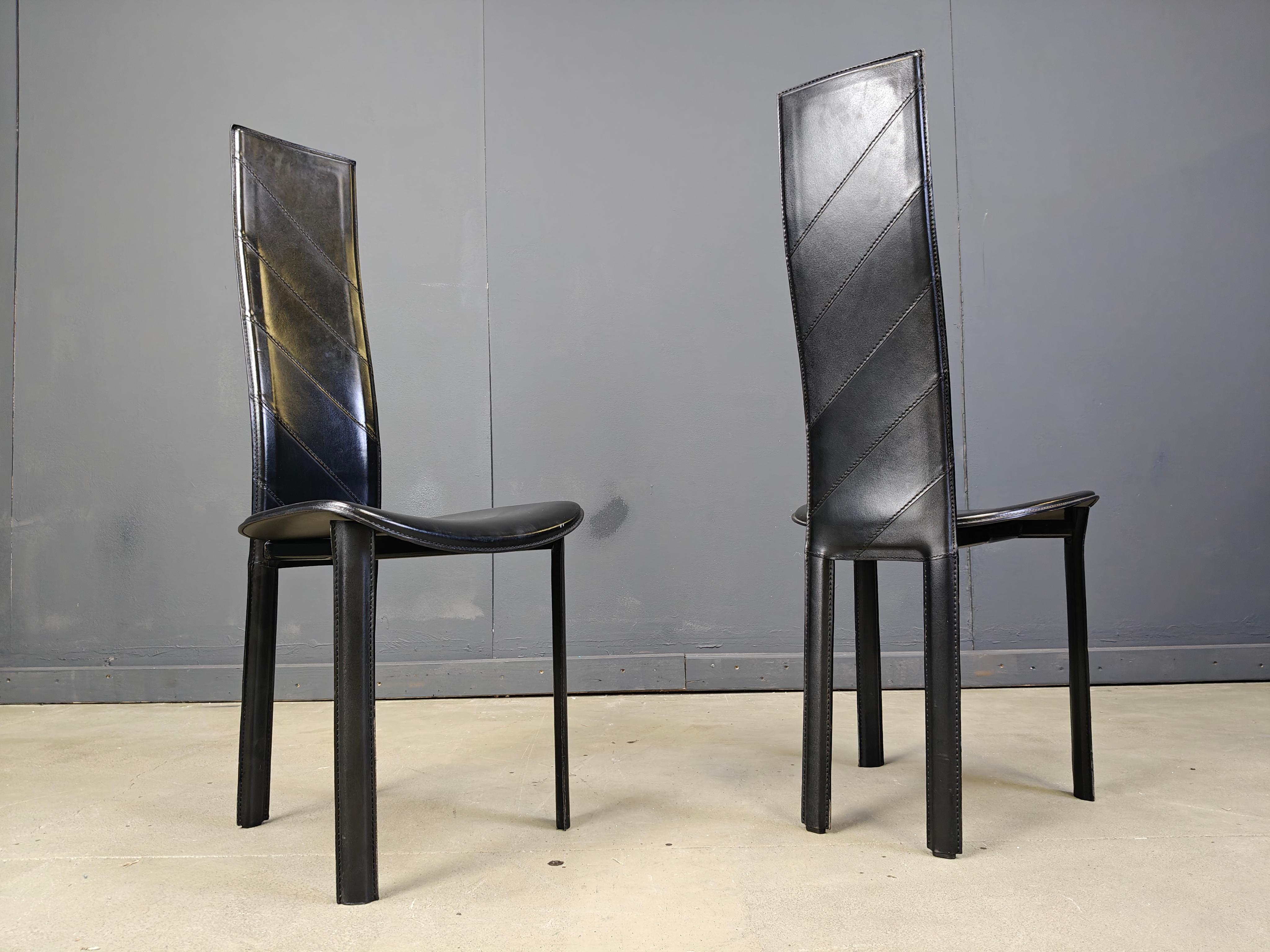 Set of 6 black italian leather high back dining chairs.

Beautiful sleek and timeless design.

The chairs are in good condition

1980s - Italy

Dimensions
Height: 108cm
Width: 43cm
Depth: 43cm
Seat height: 45cm

Ref.: 25071516

*Price is for the