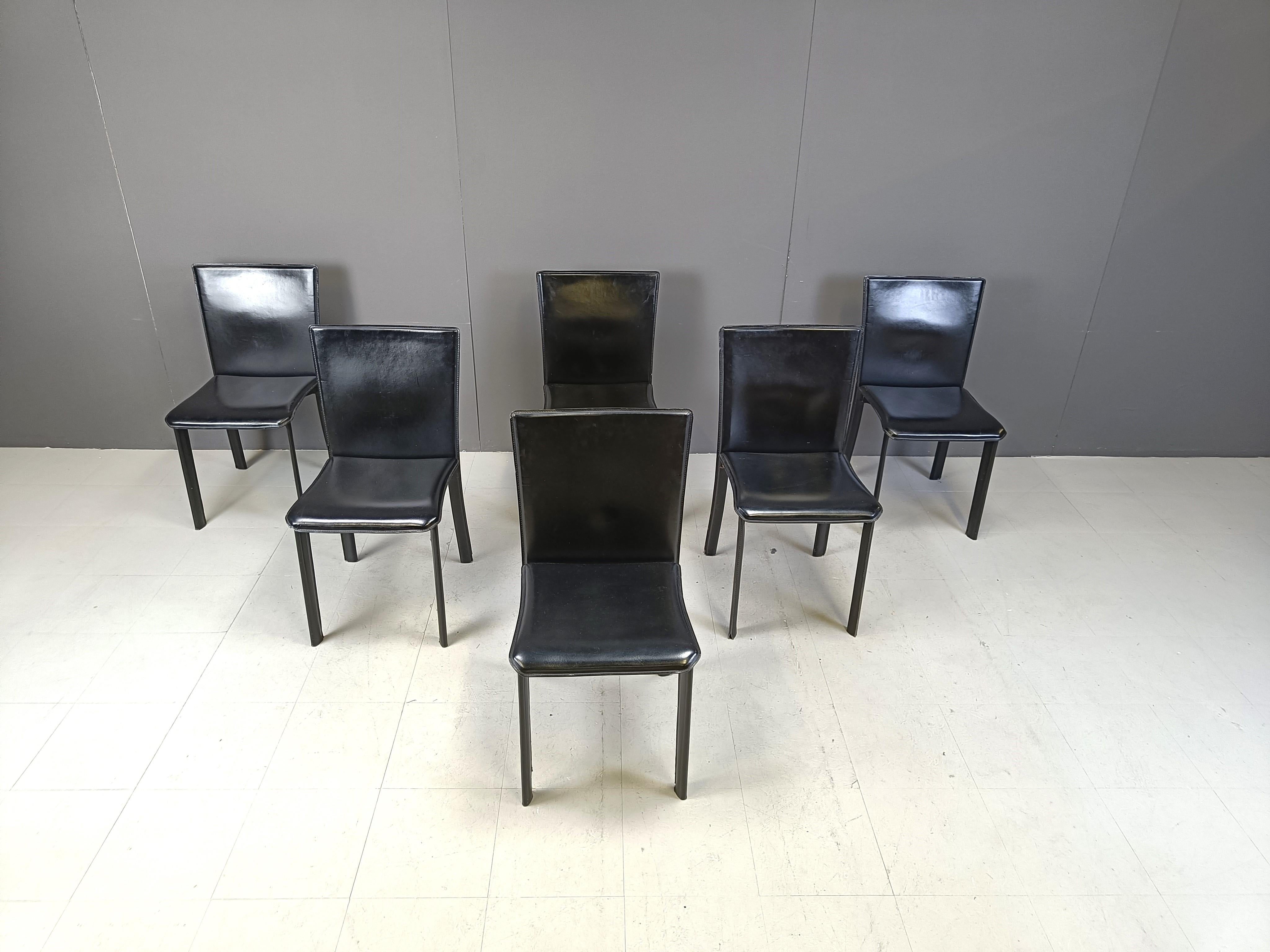 Vintage black leather dining chairs made in Italy.

These high quality dining chairs have a timeless design and are made of strong leather.

1980s - Italy

Good condition

Dimensions:
Height: 85cm
Width: 43cm
Depth: 45cm
Seat height: 45cm

Price is