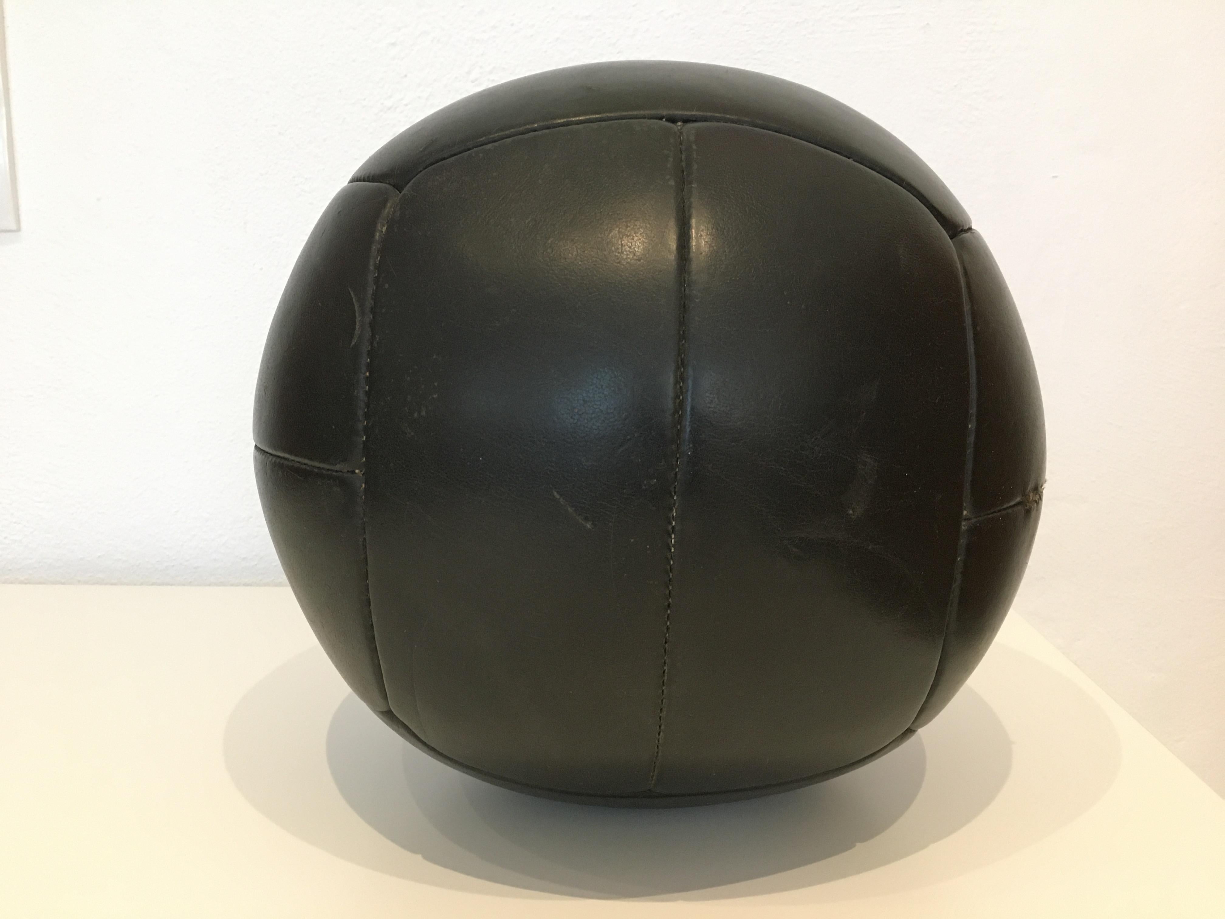This medicine ball comes from the stock of an old Czech gymnasium. Made in the 1930s. Patina consistent with age and use. Cleaned and treated with a special leather care. Weight: 4kg. Measures: Diameter 1181 inch.