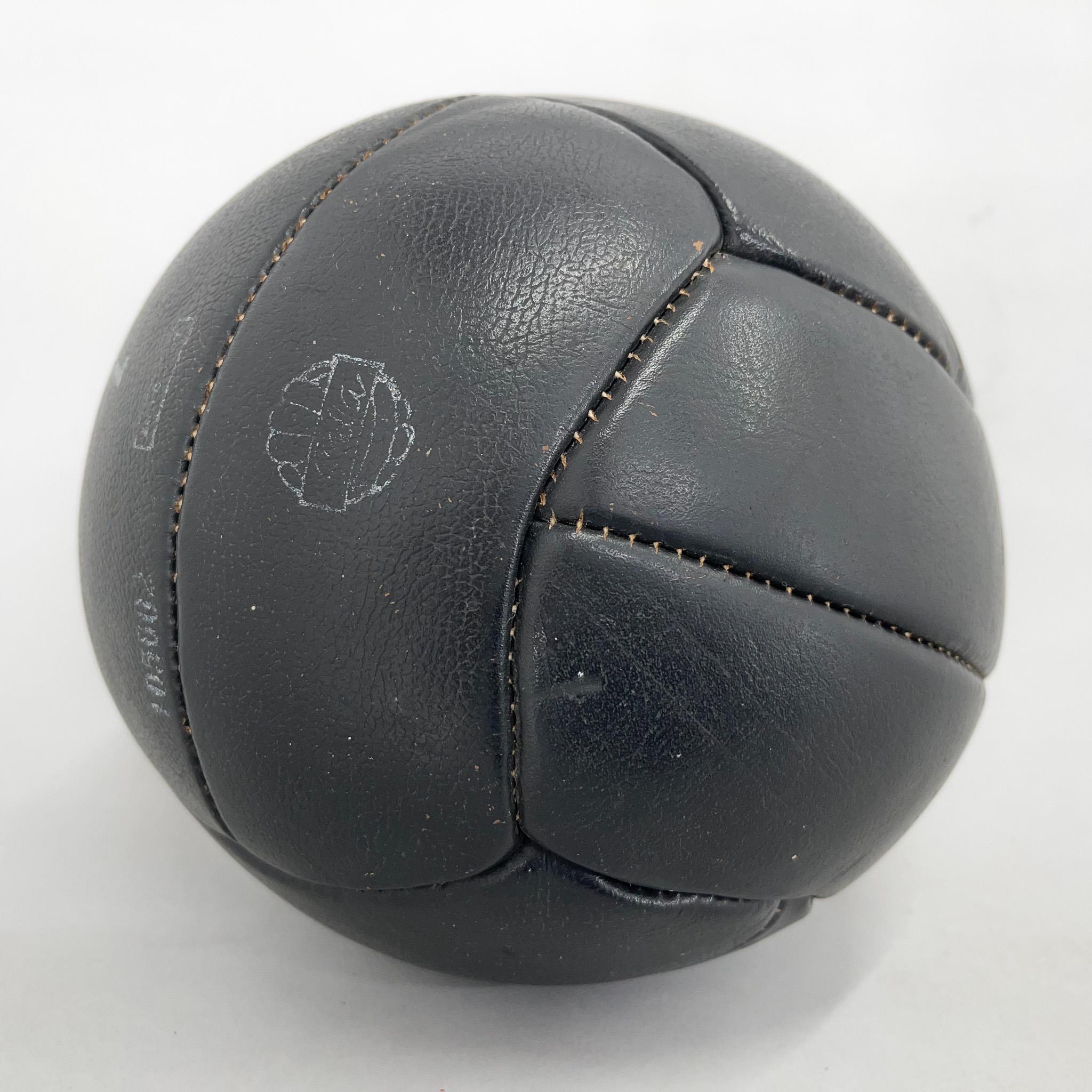 Original vintage heavy leather training ball with beautiful patina. The ball is made of handstitched genuine leather in former Czechoslovakia by Gala company in the 1930s. It can be used as an original interior accessory or as a stylish training