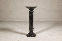 Black Marble Column Pedestal with White Veining and Stepped Base