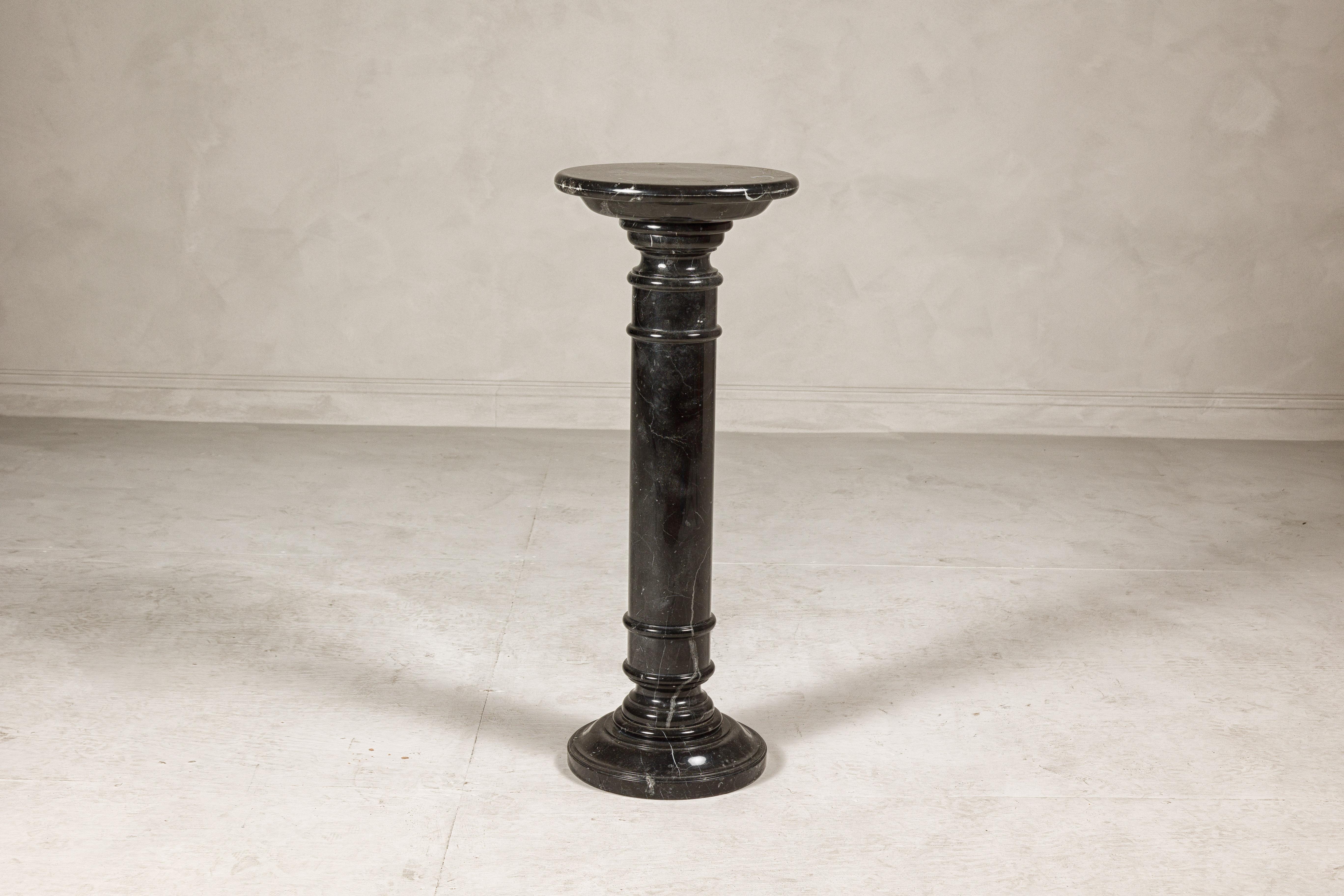 Carved Vintage Black Marble Column Pedestal with White Veining and Stepped Base For Sale