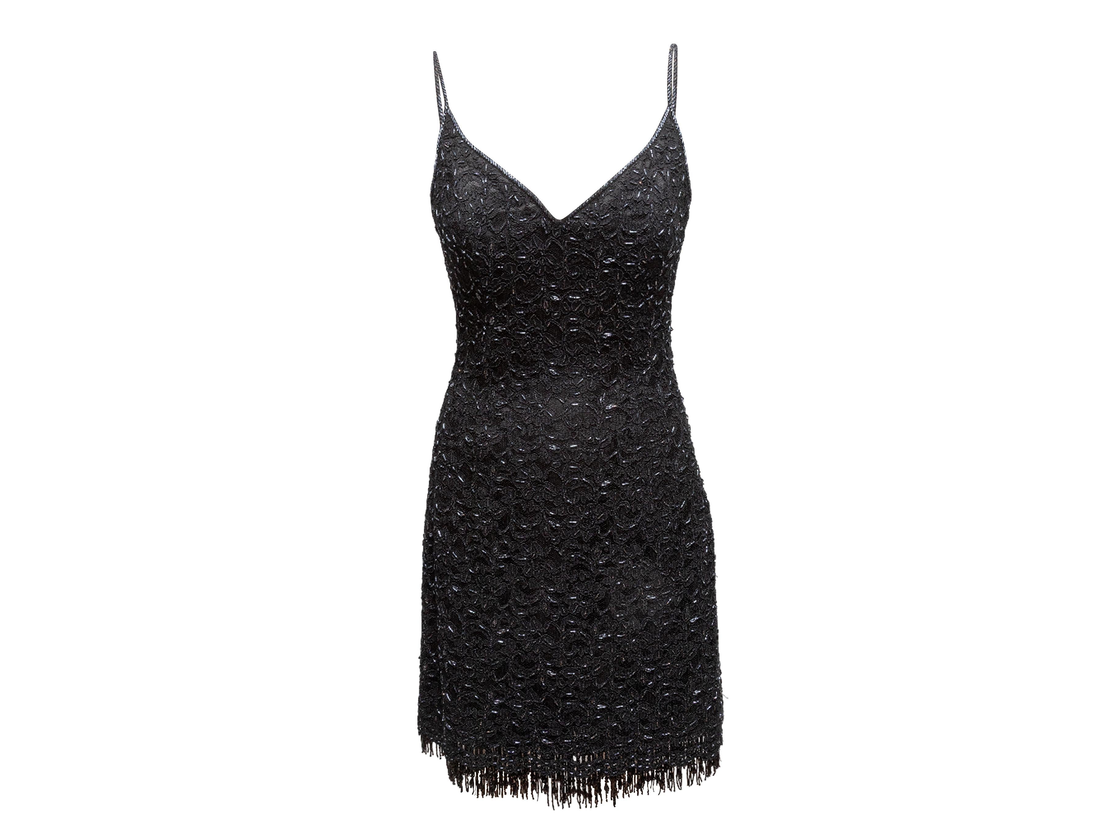 Vintage black beaded sleeveless mini cocktail dress by Max Nugus. Narrow straps. V-neck. Fringe trim at hem. 28