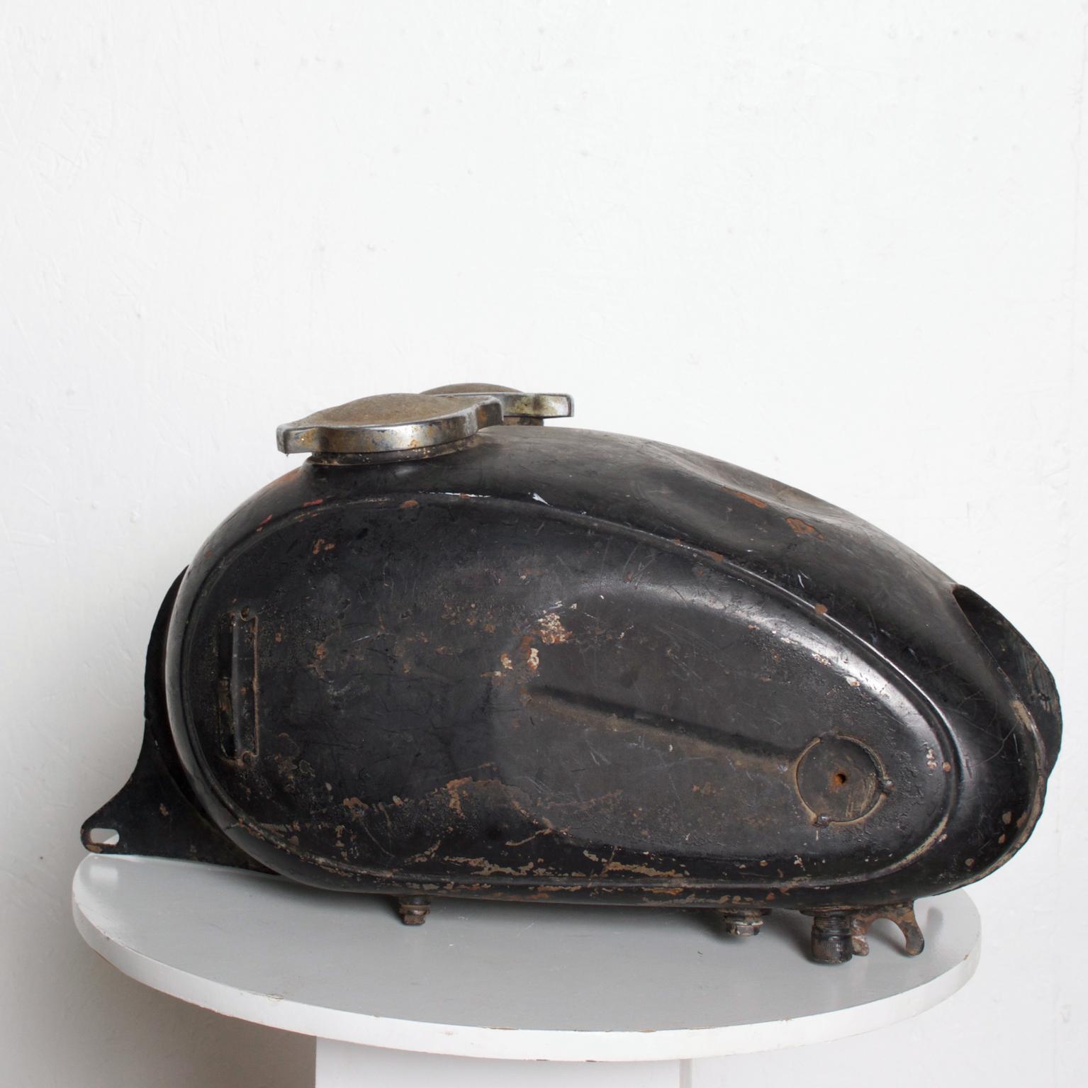 For your enjoyment an Amazing Super Vintage Motorcycle Gas Tank In Black Metal Has seen a lot of use and wear--super cool vintage. Unsure of maker. Dimensions are: 19 1/