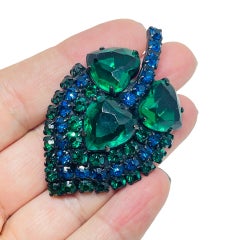 Vintage black metal sapphire emerald rhinestones designer brooch