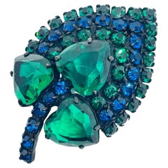Vintage black metal sapphire emerald rhinestones designer brooch