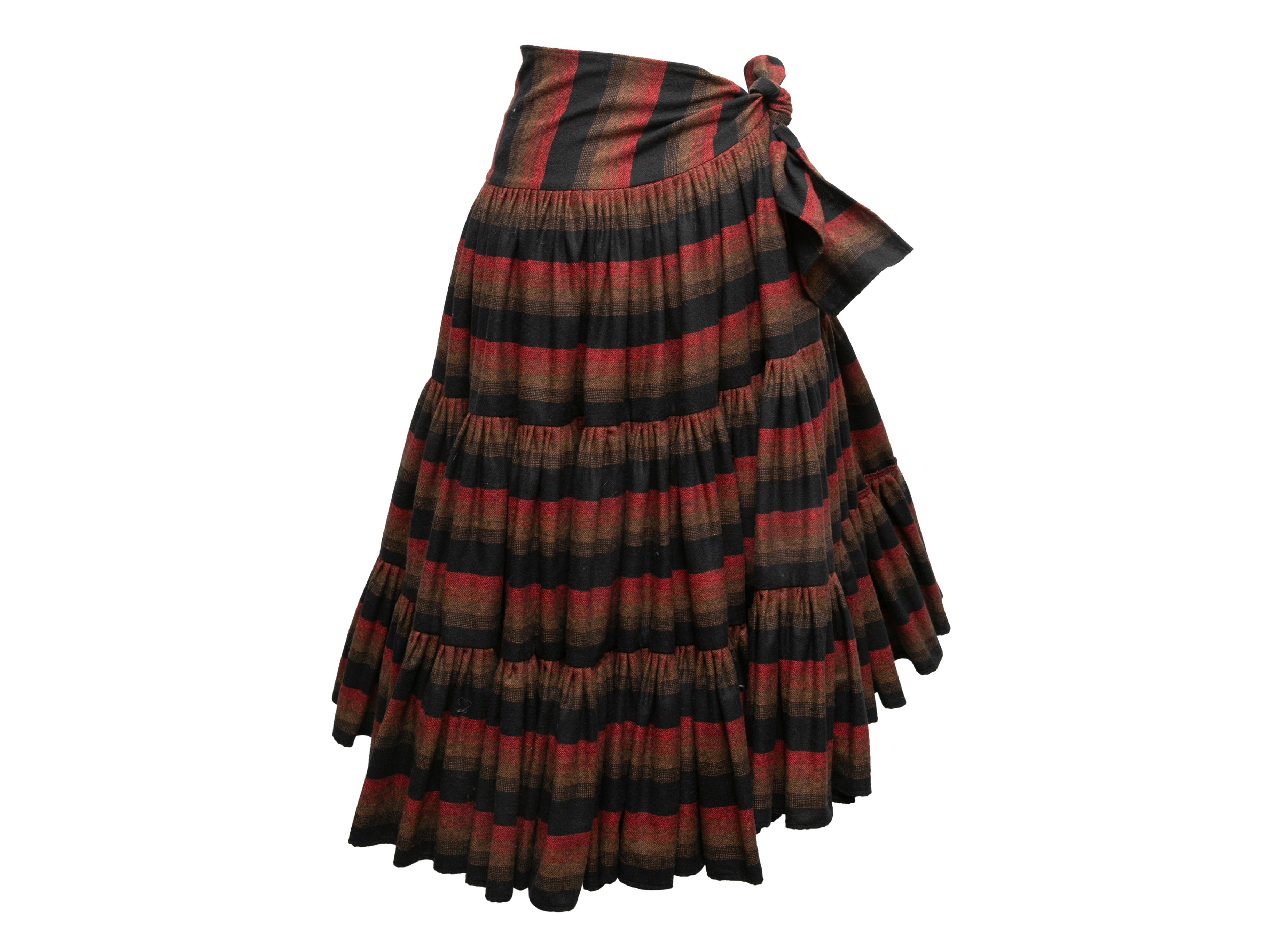 Jupe portefeuille vintage en laine rayée noire et multicolore, Norma Kamali. Vers 1970. Fermeture à nouer sur la hanche. Taille 26