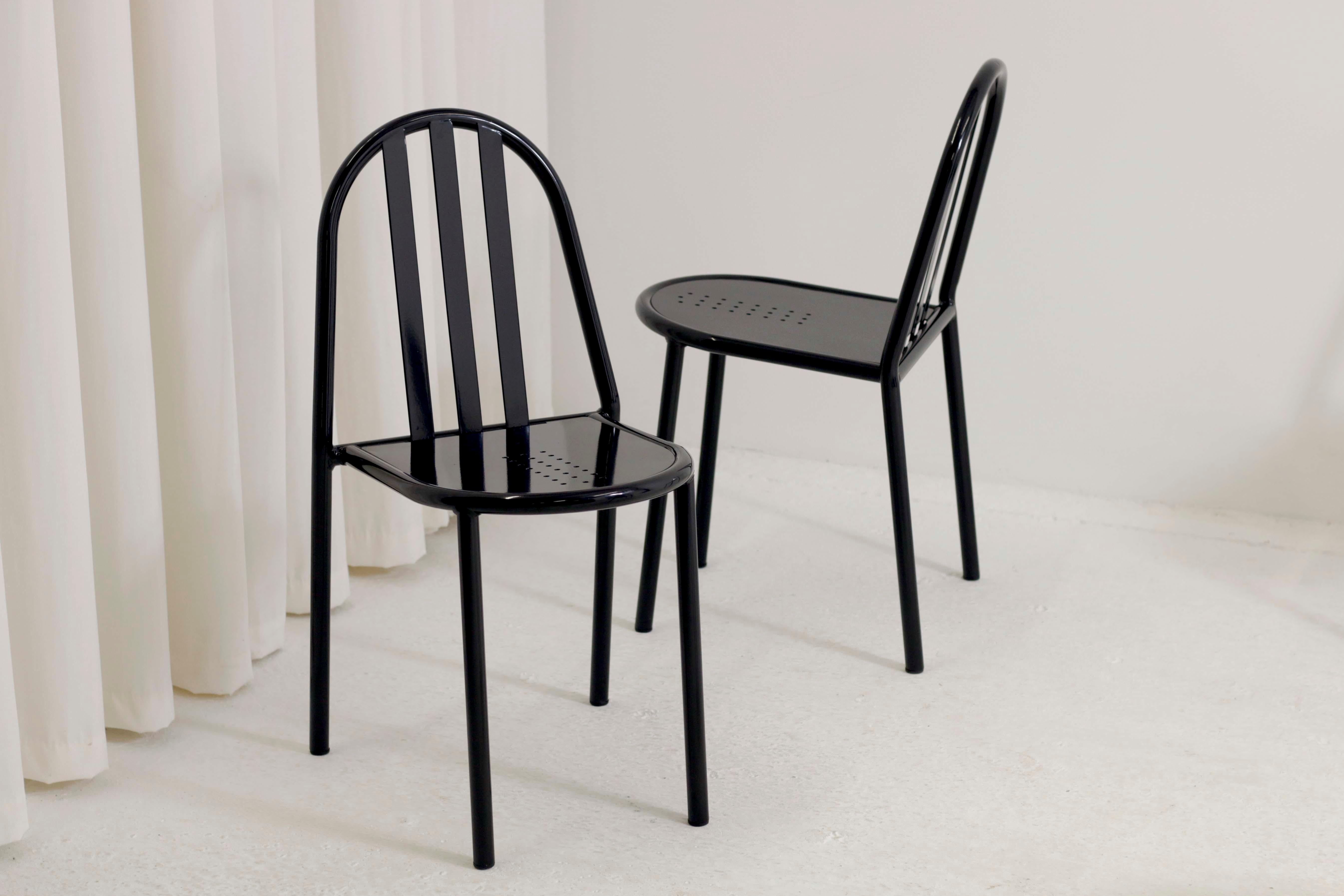 A set of 4 newly restored No.222 stacking chairs by Robert Mallet Stevens. Lacquered black metal in excellent condition with new rubber pads under the legs.

Dimensions: W40cm D46cm H81cm SH46cm.