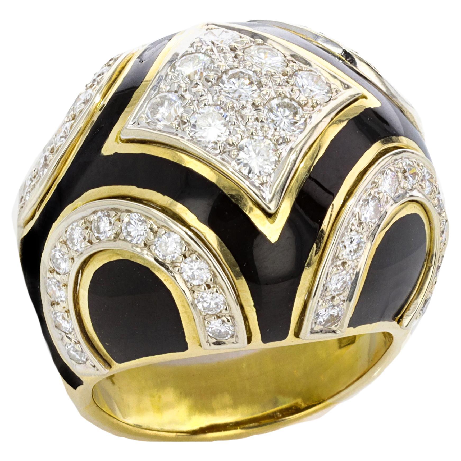 Ladies 18K yellow gold black onyx and diamond dome ring.  The ring contains approximately 1.55 ctw of diamonds. The ring is a size 6.
