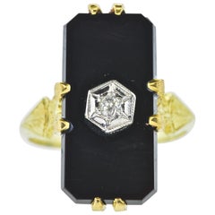 Antique Black Onyx, Diamond and Yellow and White Gold Ring, circa 1940