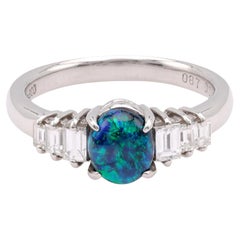 Platinring mit schwarzem Opal und Diamant