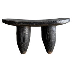 Taburete africano vintage pintado de negro