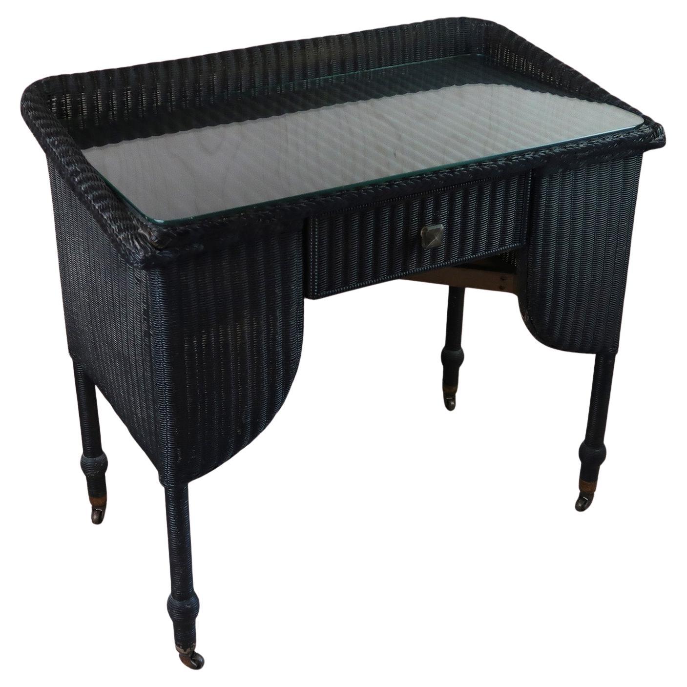 Table console Vintage Art Deco Lloyd Loom peinte en noir. A.I.C. C.1930 en vente
