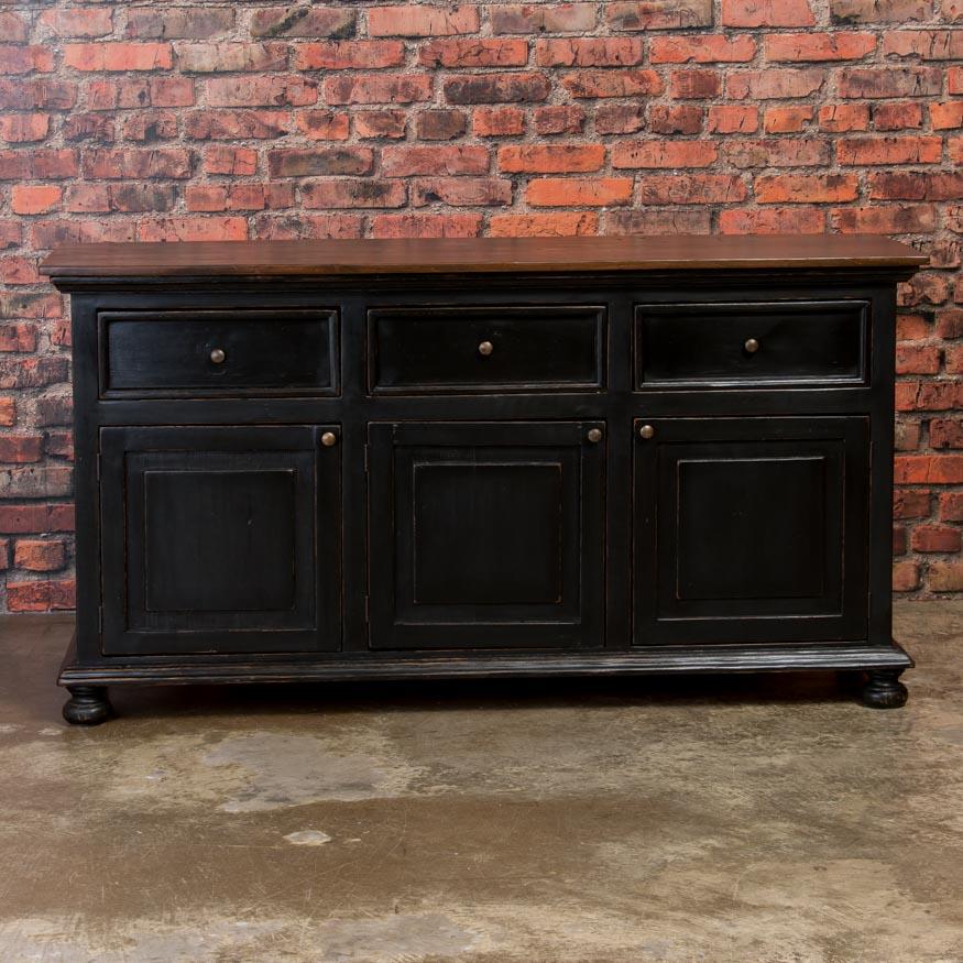 This delightful pine sideboard has been given a black painted finish, adding charm and an 