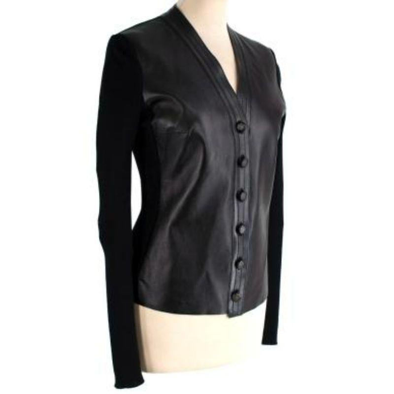 Gucci Vintage Black Panelled Leather & Knit Cardigan
 
 
 
 - Luscious leather with knitted sleeves.
 
 - slim-fit
 
 - Button up.
 
 - Equestrian style. 
 
 
 
 Made in Italy.
 
 No care label. 
 
 Condition 9/10. Excellent vintage condition
 
 
 
