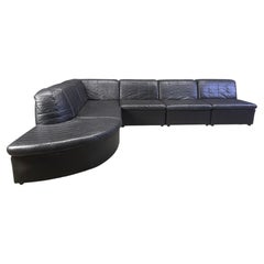 Vintage black patchwork leather modular sofa set by Laauser, 1970s